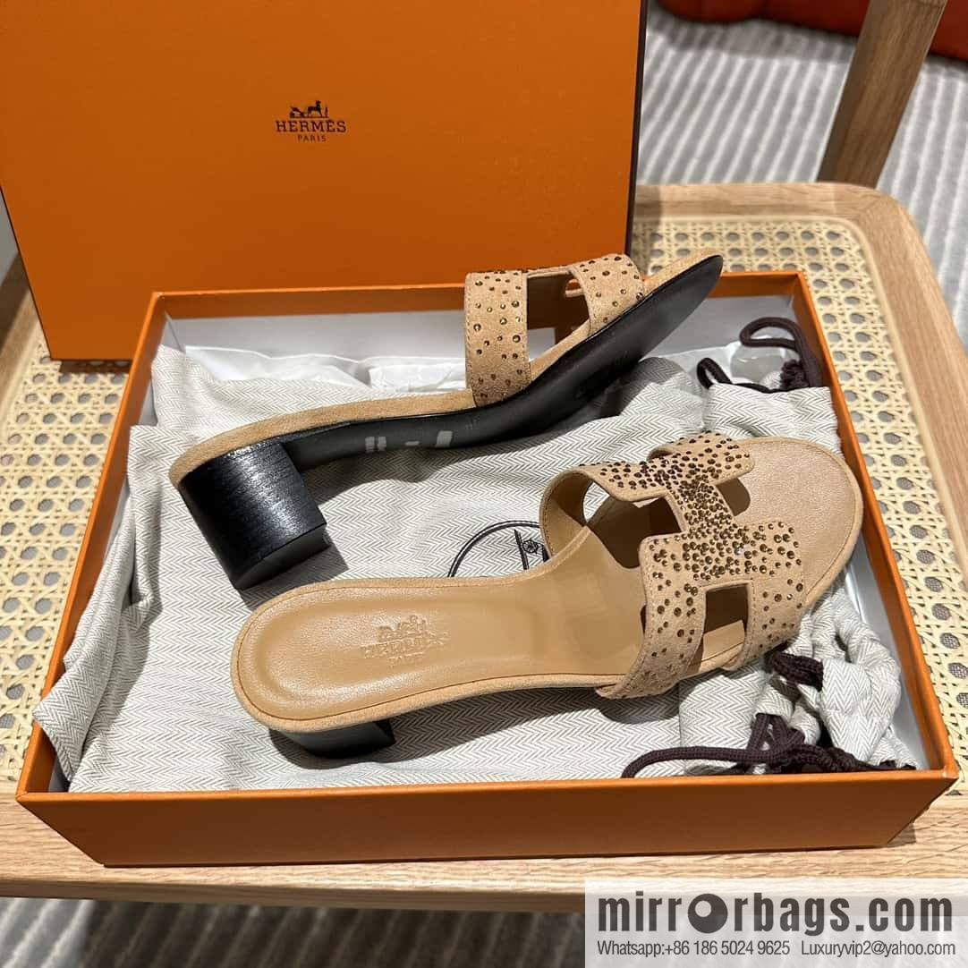 Hermes, the classic new diamond-faced H slippers.