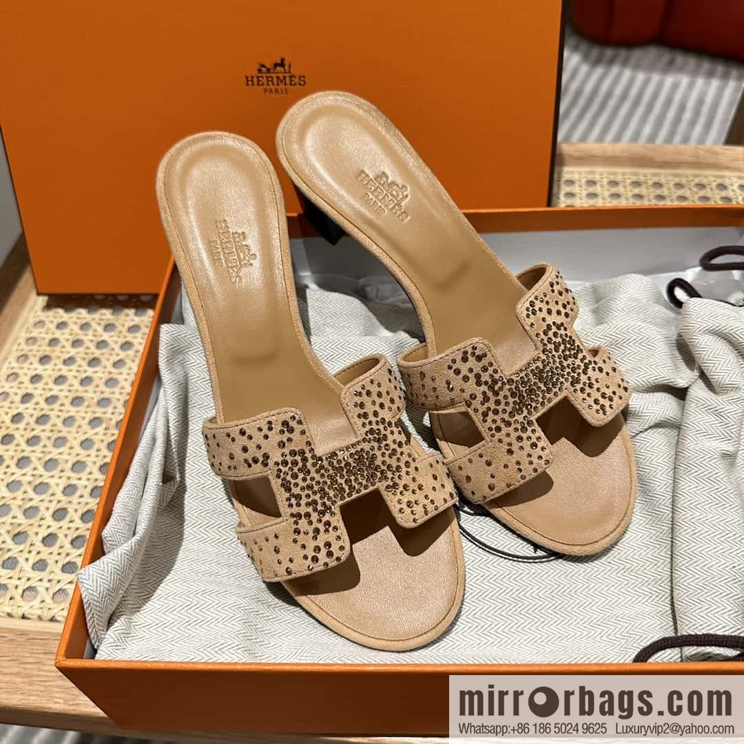 Hermes, the classic new diamond-faced H slippers.