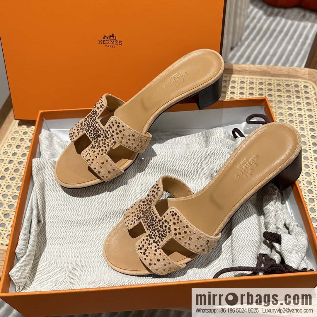 Hermes, the classic new diamond-faced H slippers.