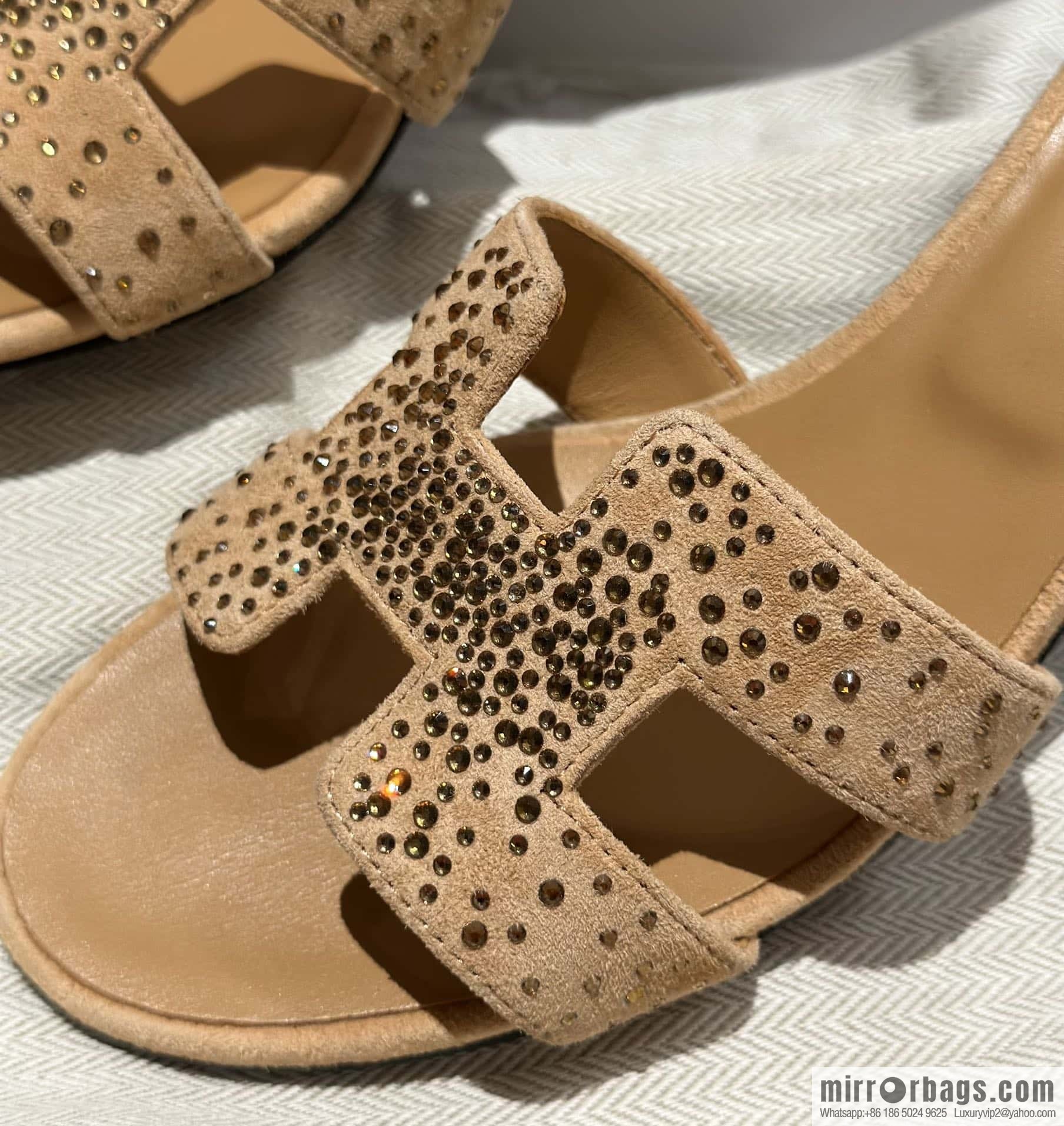 Hermes, the classic new diamond-faced H slippers.