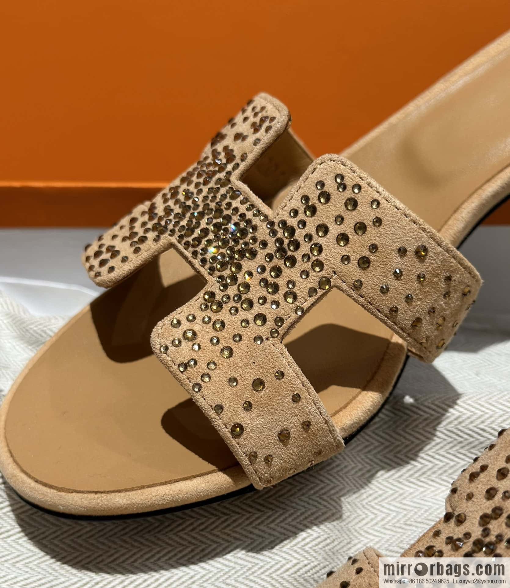 Hermes, the classic new diamond-faced H slippers.