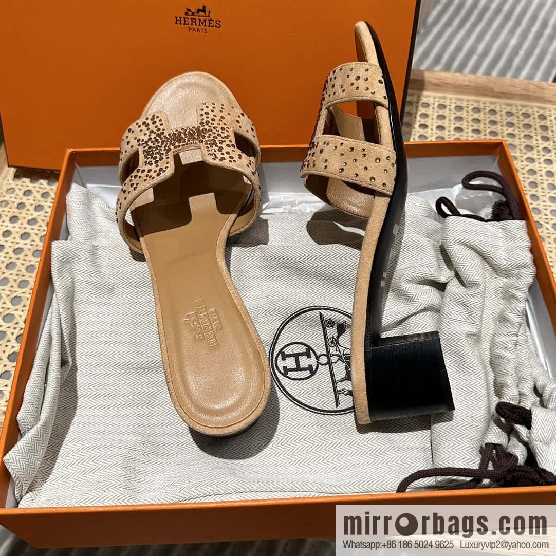Hermes, the classic new diamond-faced H slippers.