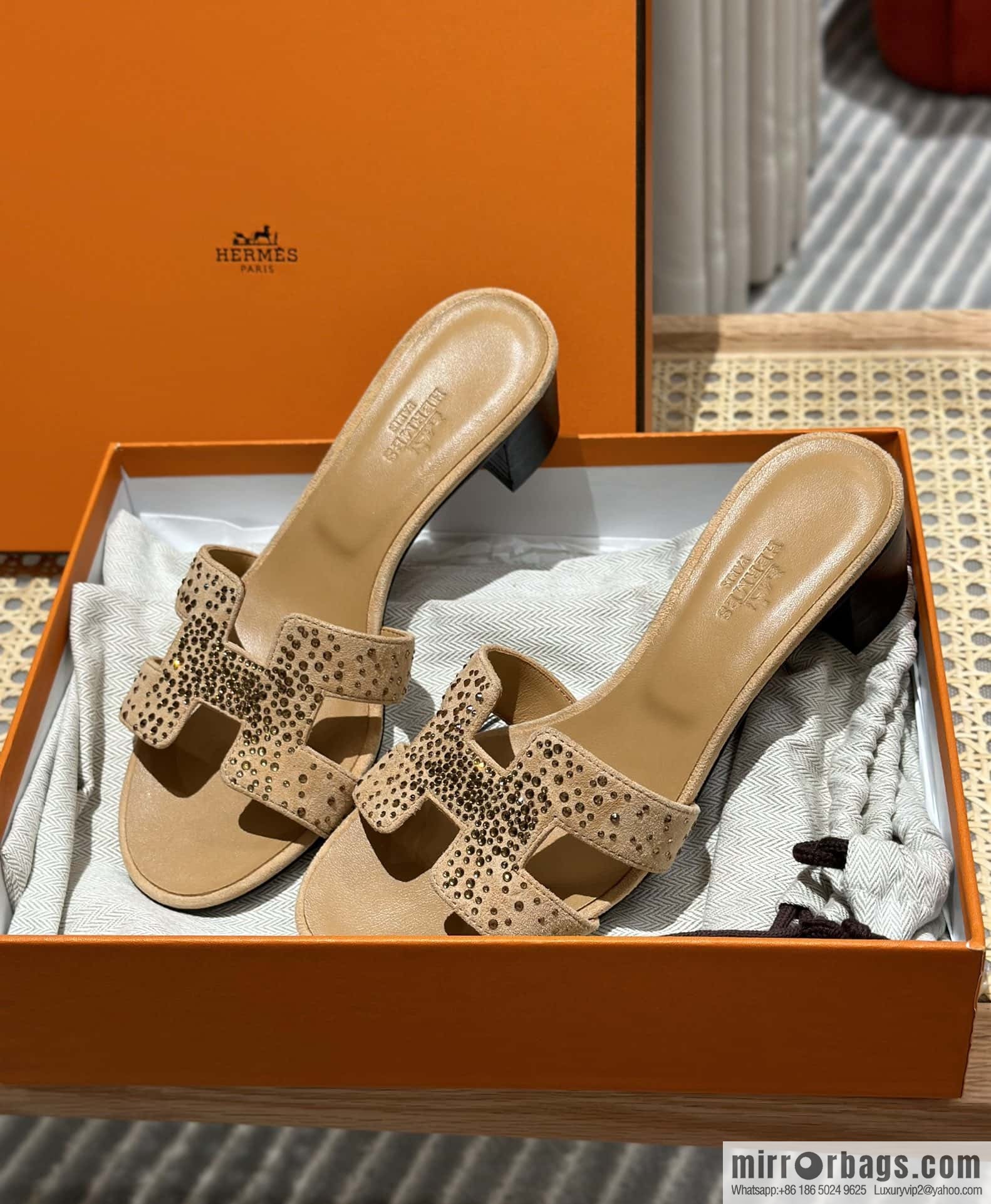 Hermes, the classic new diamond-faced H slippers.