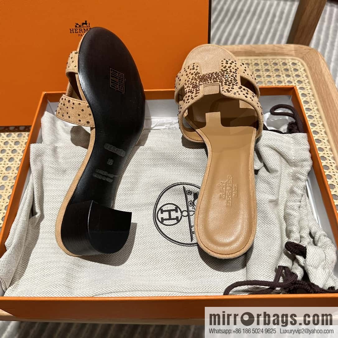 Hermes, the classic new diamond-faced H slippers.