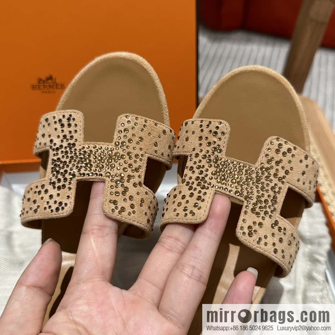 Hermes, the classic new diamond-faced H slippers.