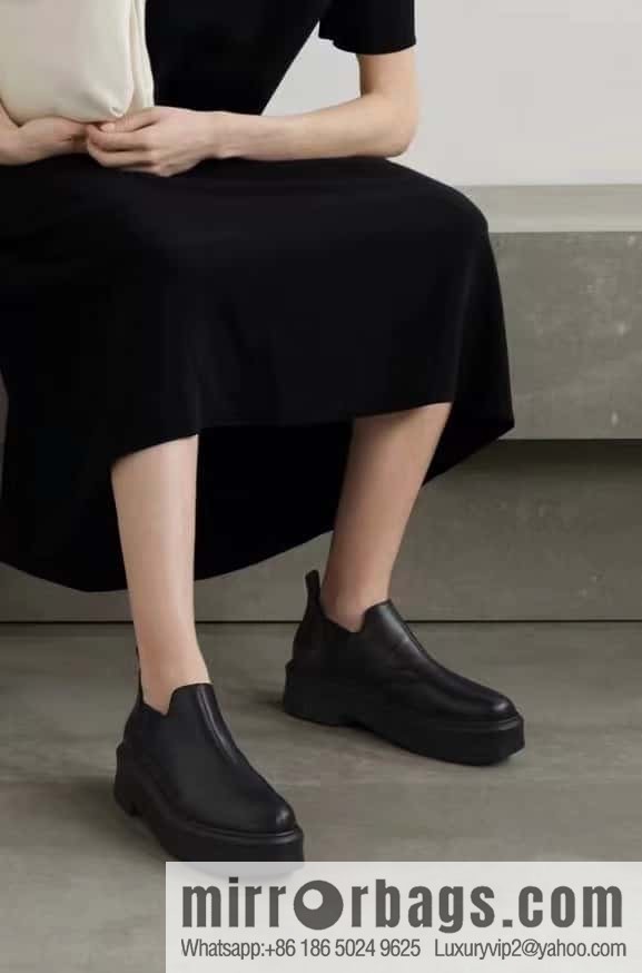 THE ROW platform boots