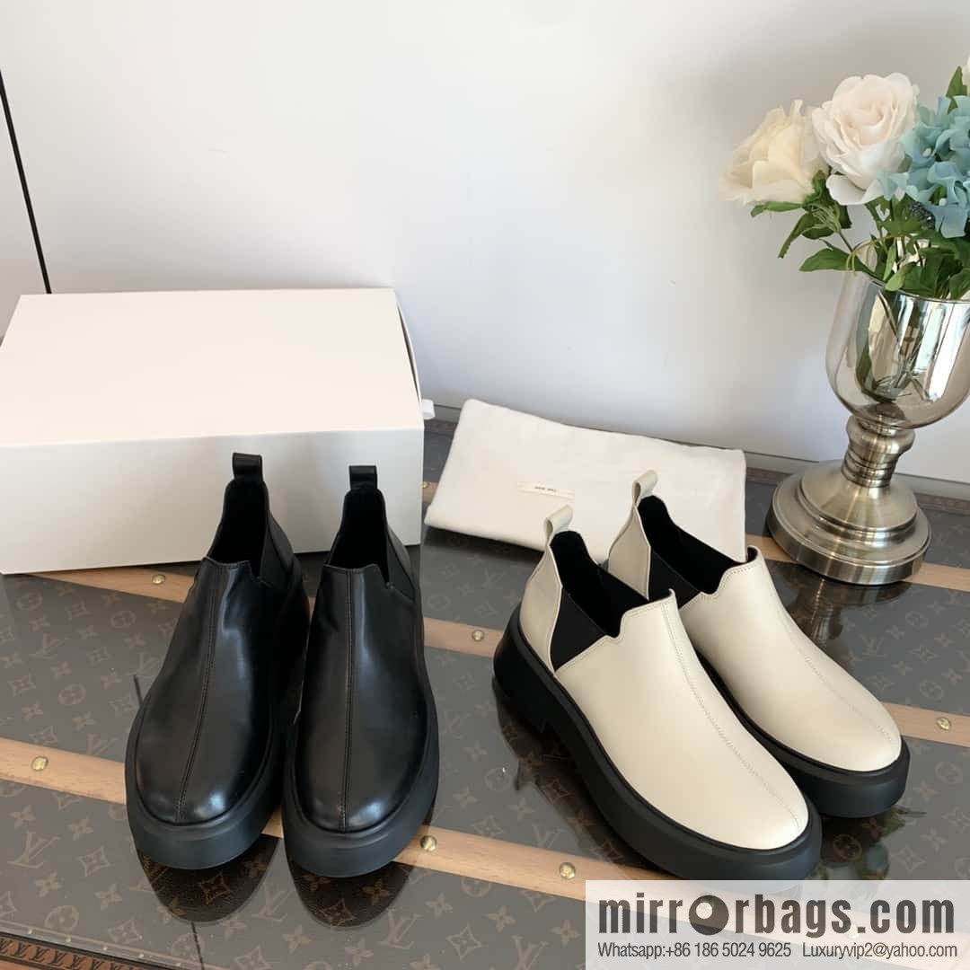 THE ROW platform boots