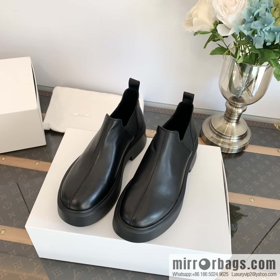 THE ROW platform boots