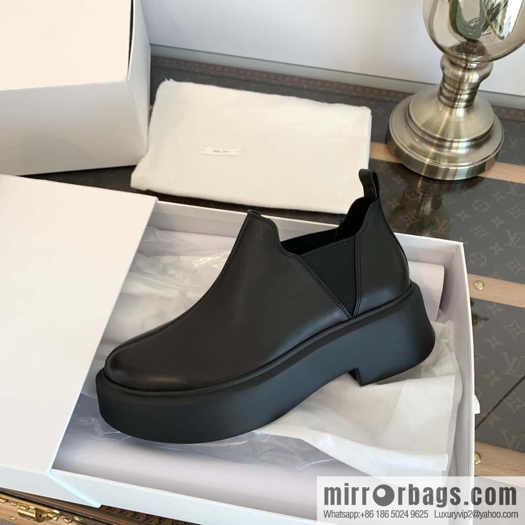 THE ROW platform boots
