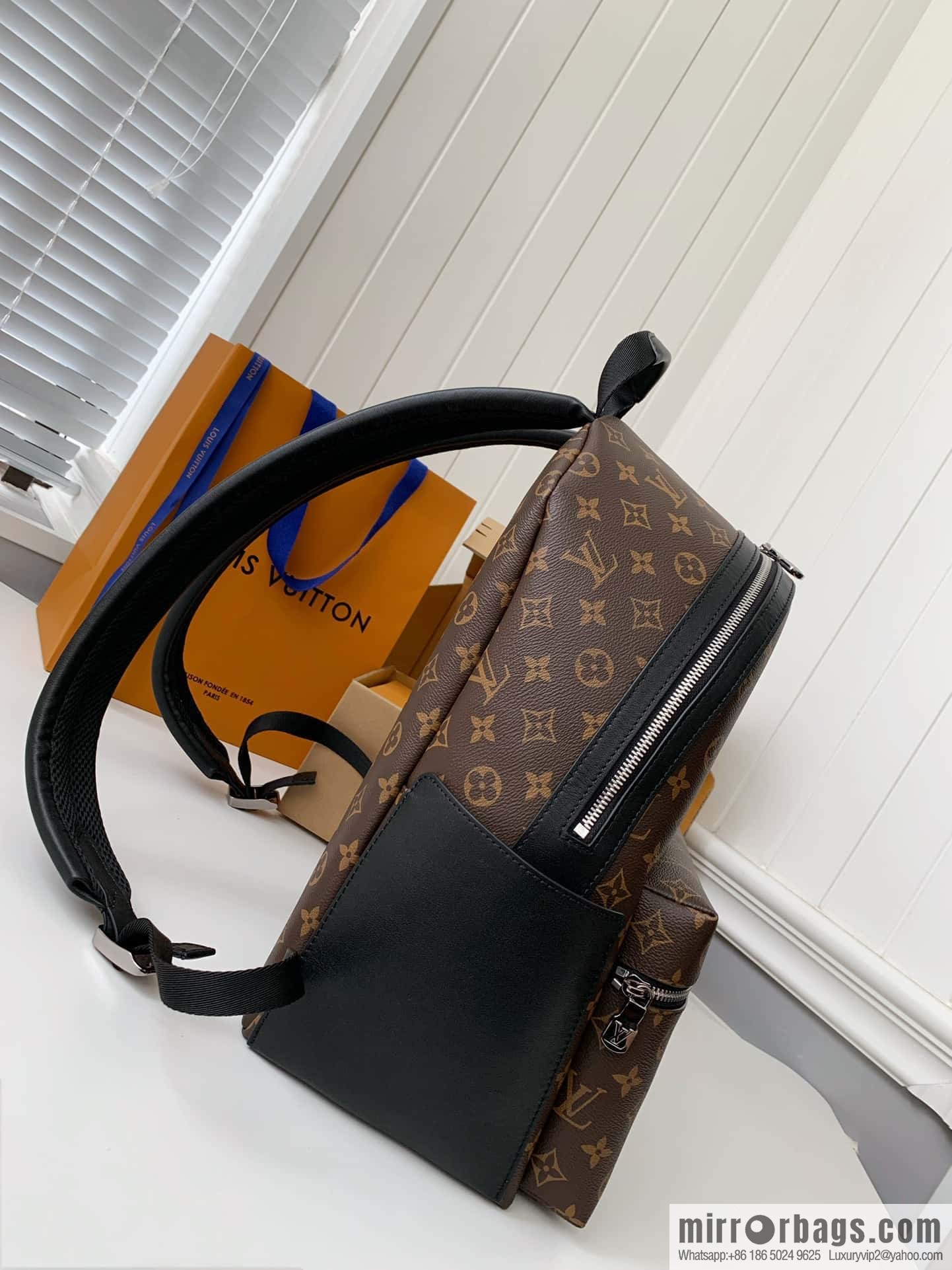 LV M46684 Discovery Backpack PM