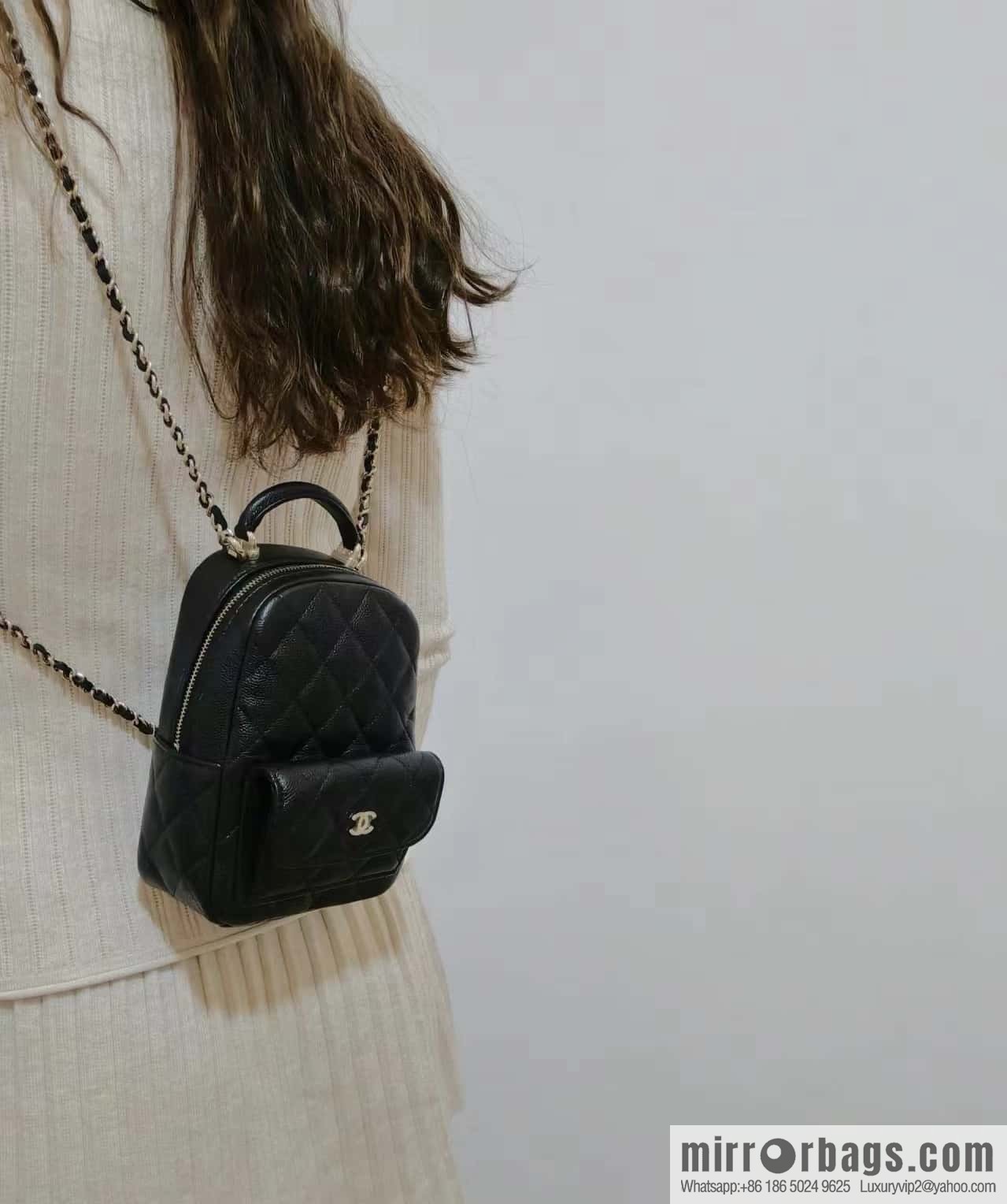 CHANEL 24C early spring vacation series, lychee leather backpack AP3753 black