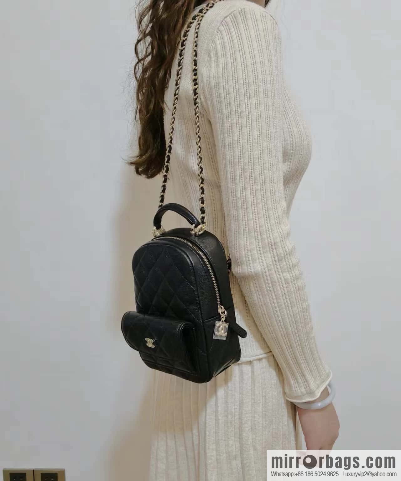 CHANEL 24C early spring vacation series, lychee leather backpack AP3753 black