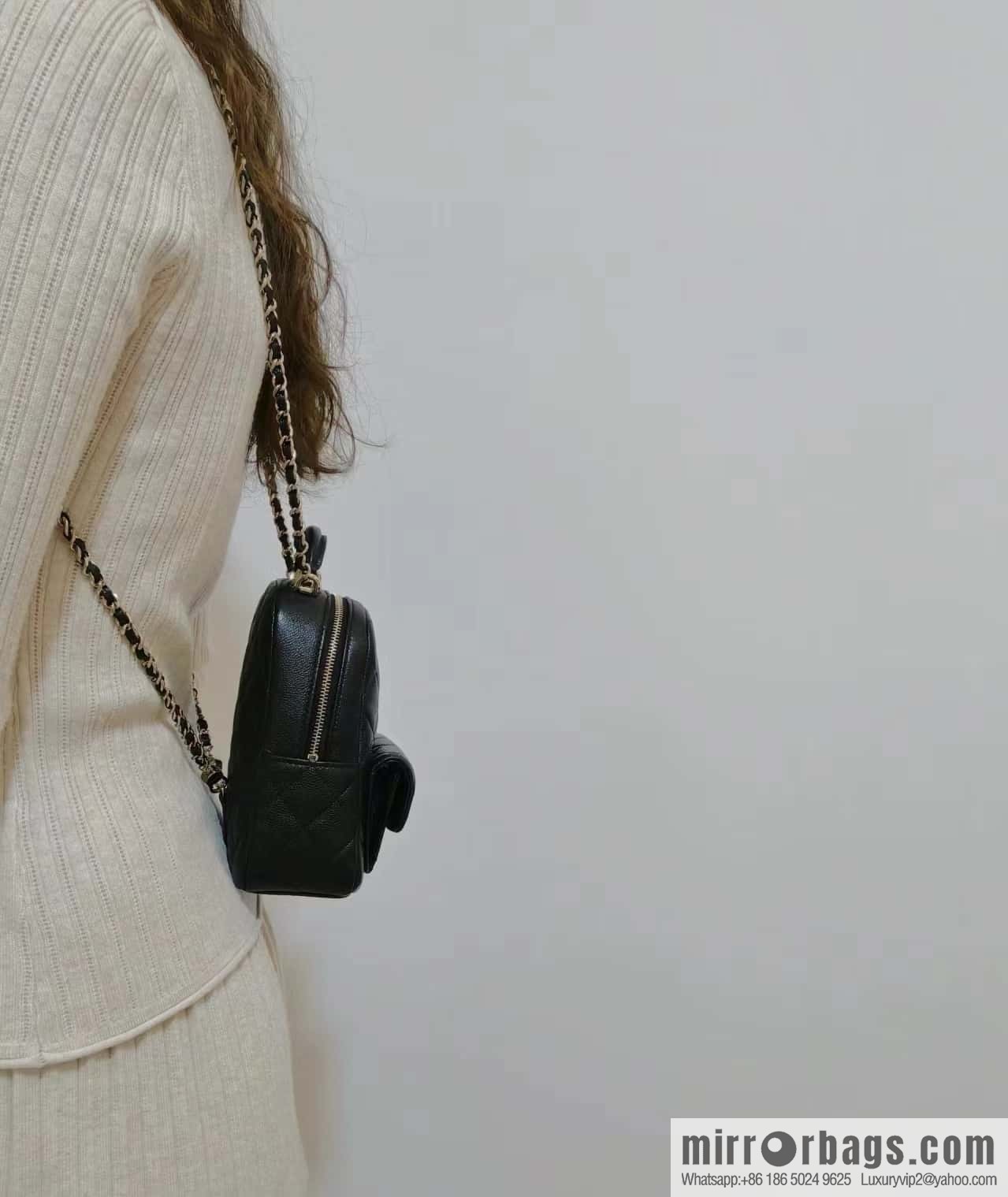 CHANEL 24C early spring vacation series, lychee leather backpack AP3753 black