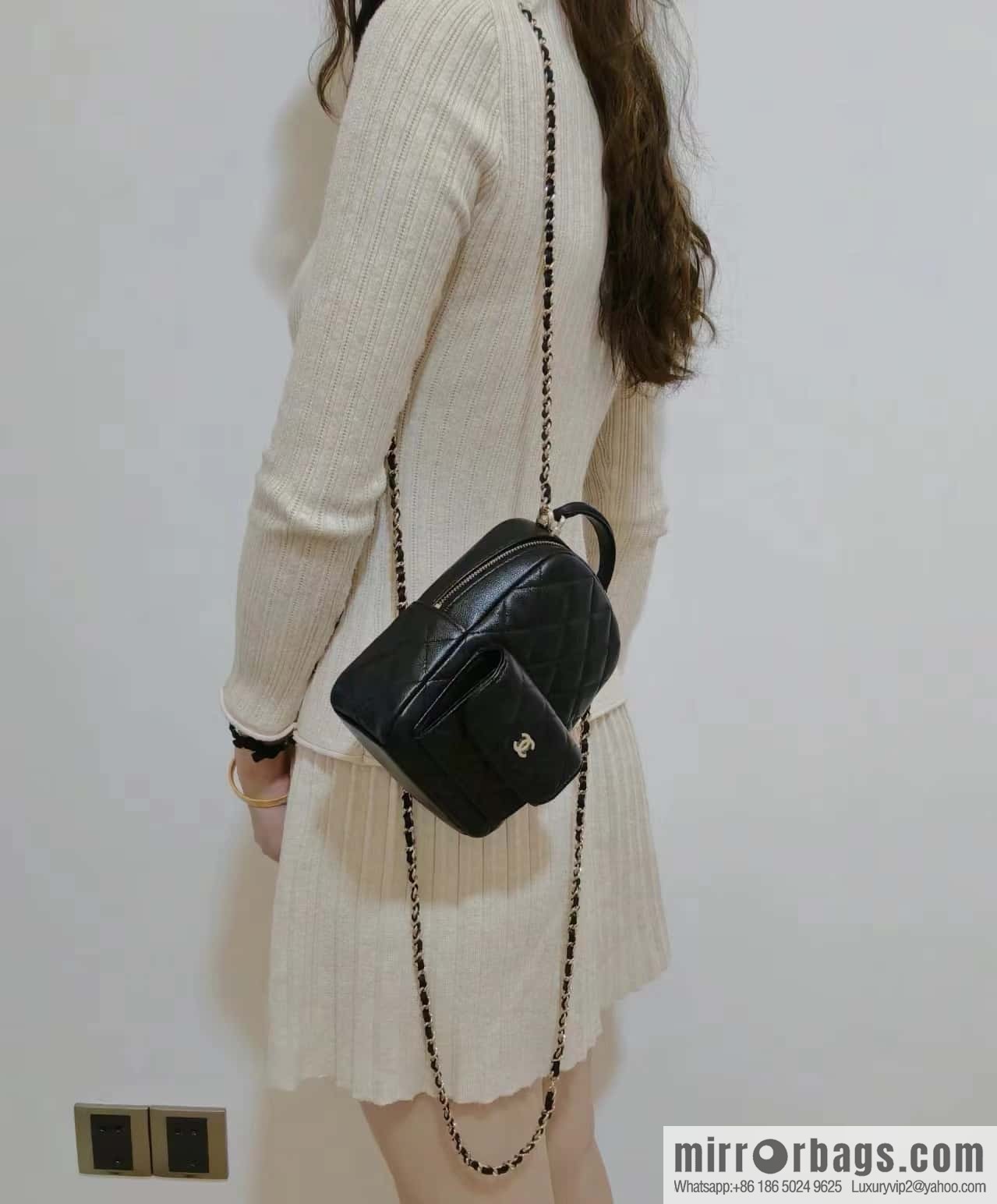 CHANEL 24C early spring vacation series, lychee leather backpack AP3753 black