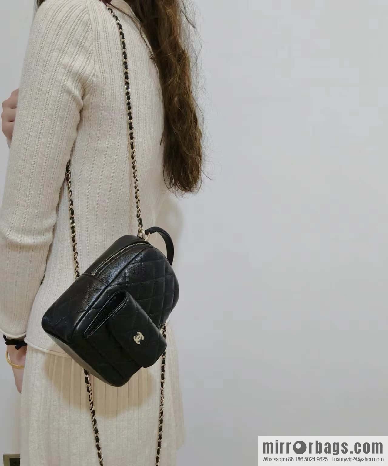 CHANEL 24C early spring vacation series, lychee leather backpack AP3753 black