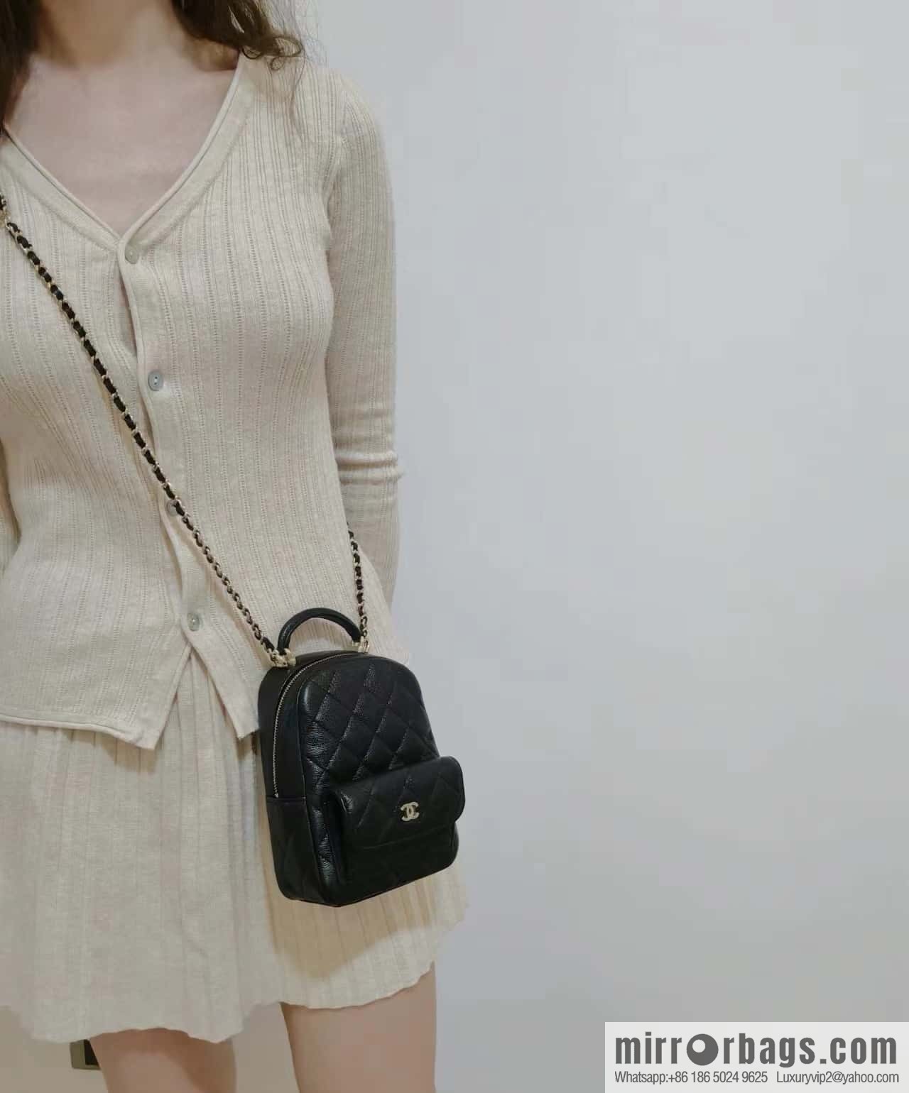 CHANEL 24C early spring vacation series, lychee leather backpack AP3753 black