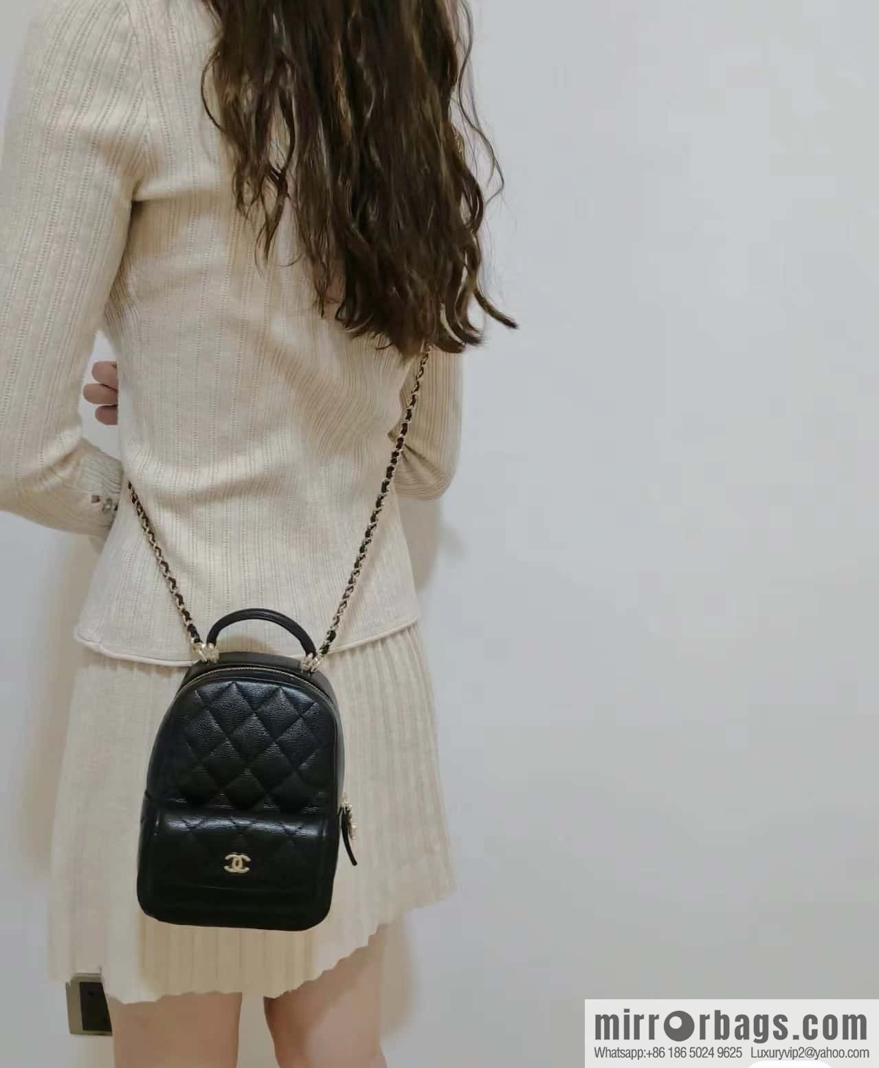 CHANEL 24C early spring vacation series, lychee leather backpack AP3753 black