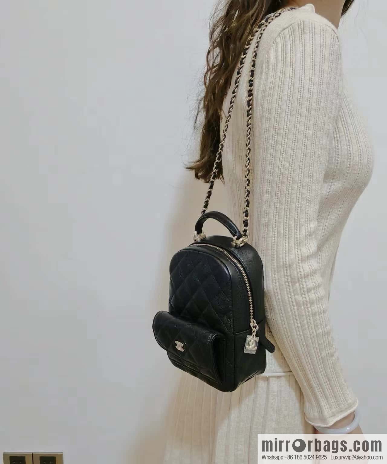 CHANEL 24C early spring vacation series, lychee leather backpack AP3753 black