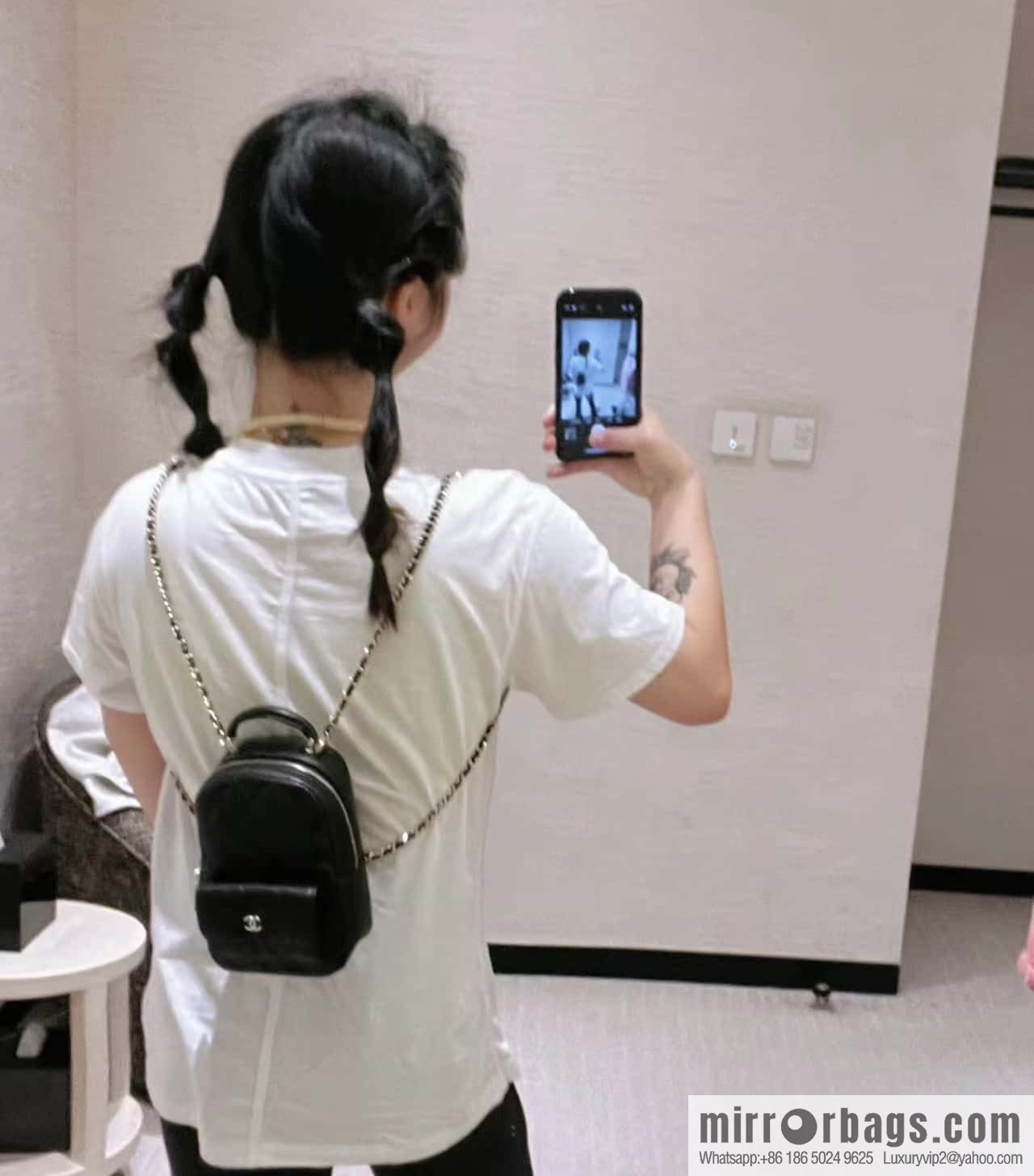 CHANEL 24C early spring vacation series, lychee leather backpack AP3753 black