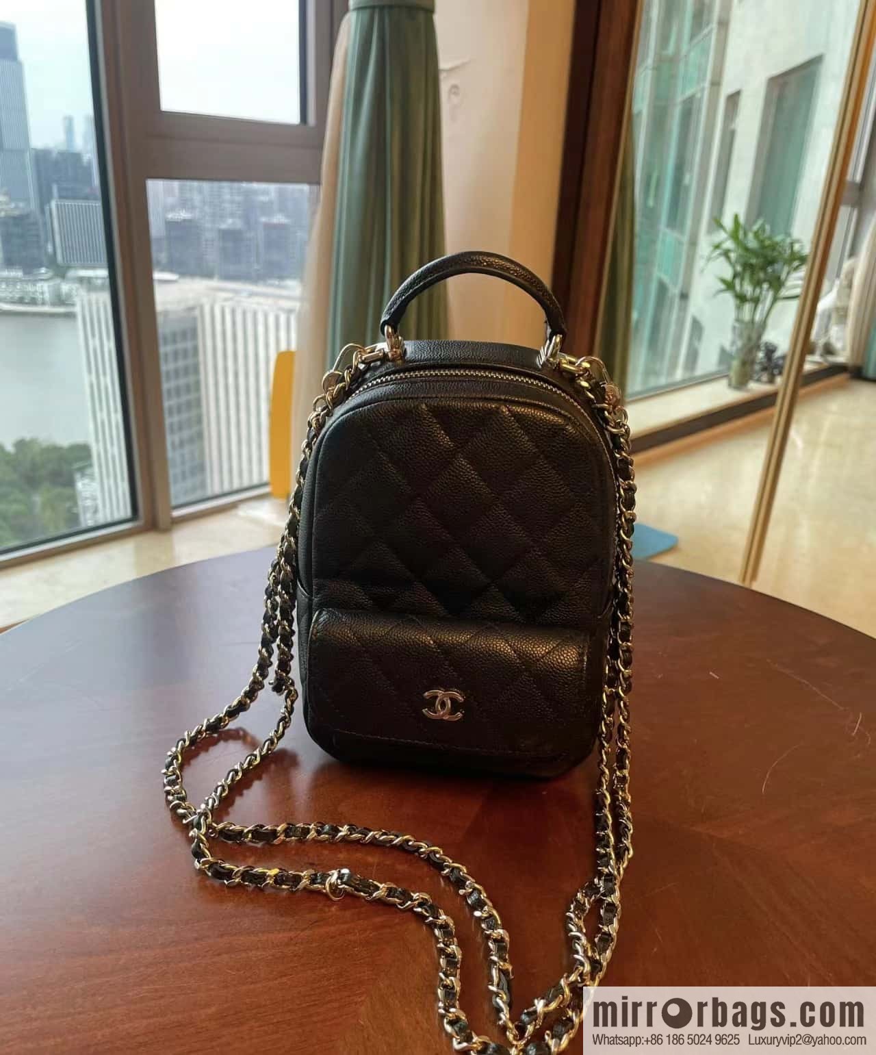 CHANEL 24C early spring vacation series, lychee leather backpack AP3753 black