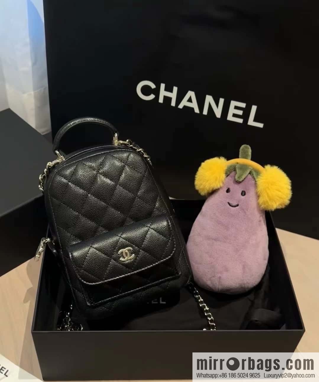 CHANEL 24C early spring vacation series, lychee leather backpack AP3753 black