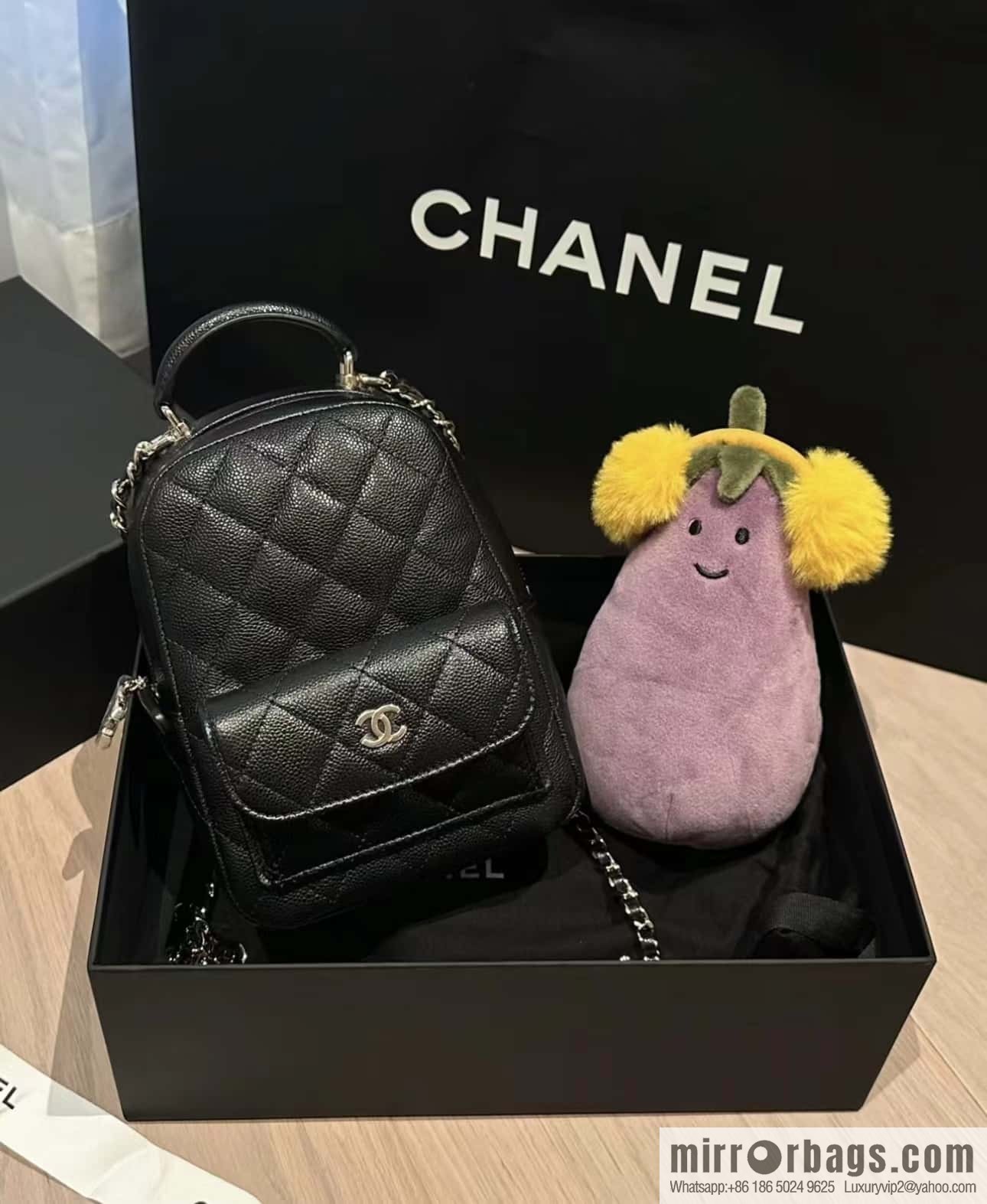 CHANEL 24C early spring vacation series, lychee leather backpack AP3753 black