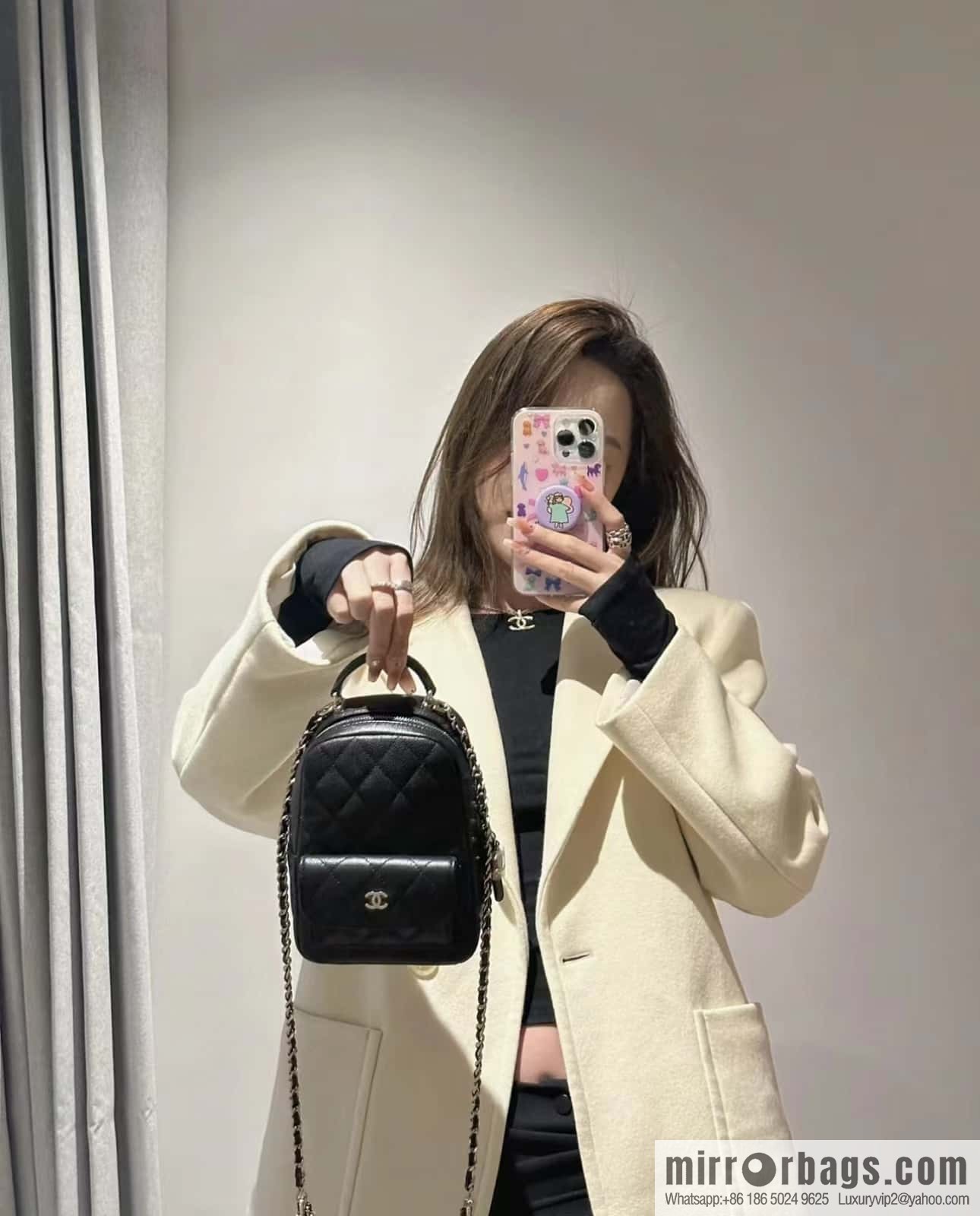 CHANEL 24C early spring vacation series, lychee leather backpack AP3753 black