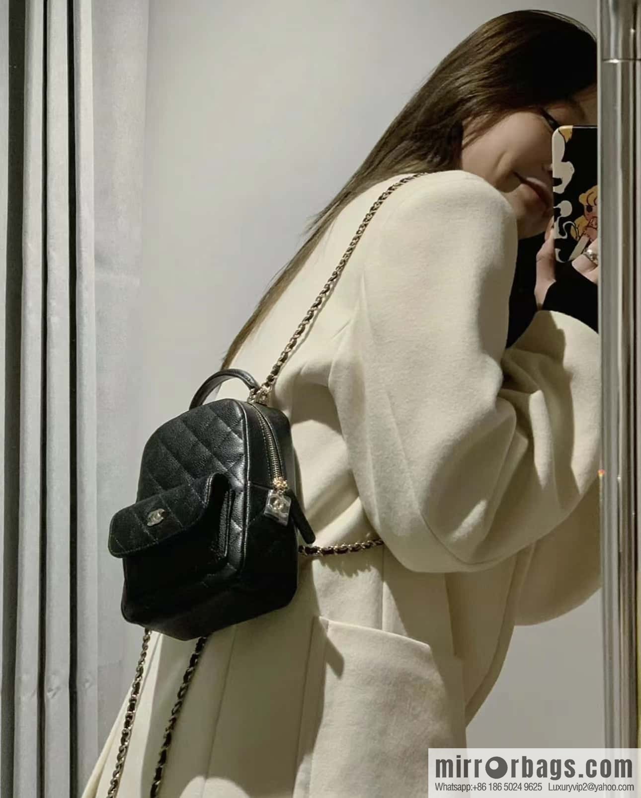 CHANEL 24C early spring vacation series, lychee leather backpack AP3753 black