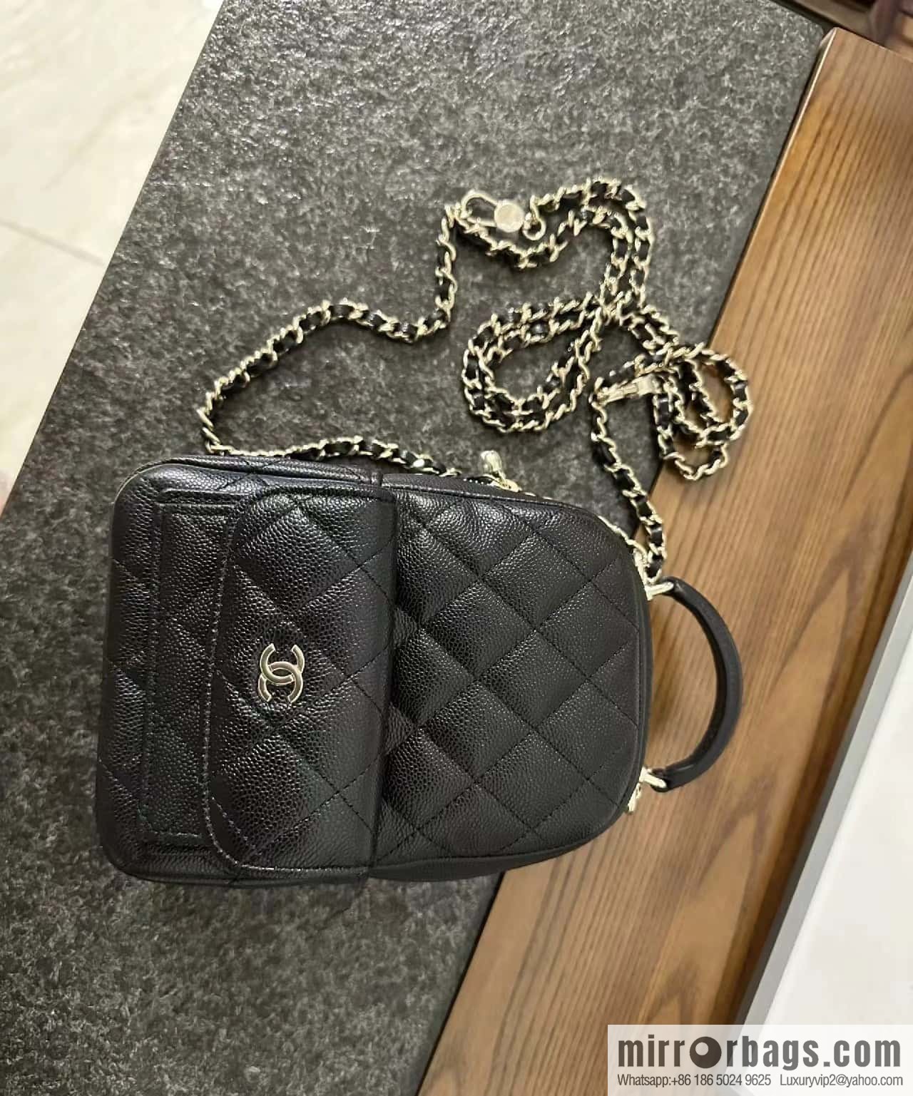 CHANEL 24C early spring vacation series, lychee leather backpack AP3753 black
