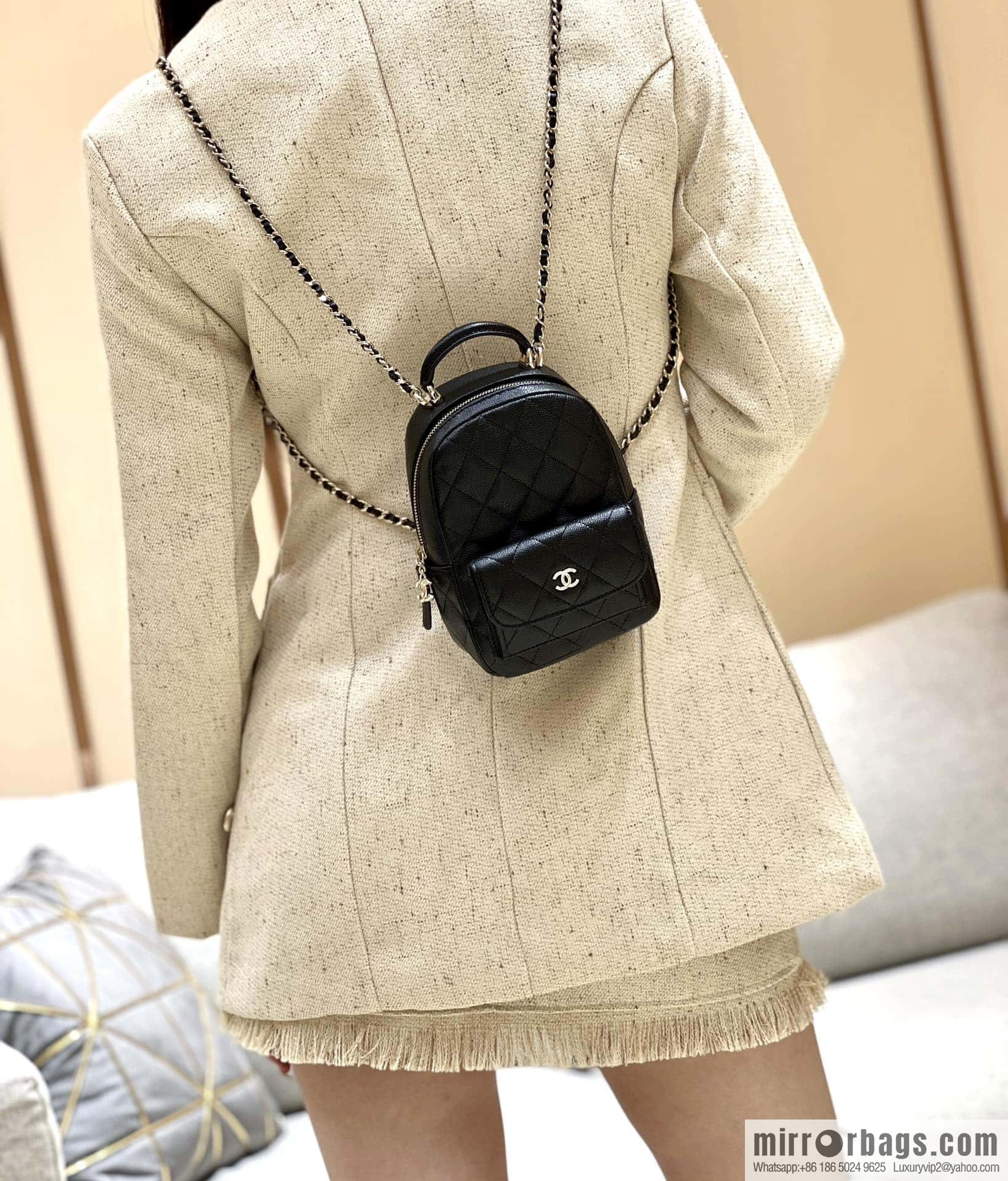 CHANEL 24C early spring vacation series, lychee leather backpack AP3753 black