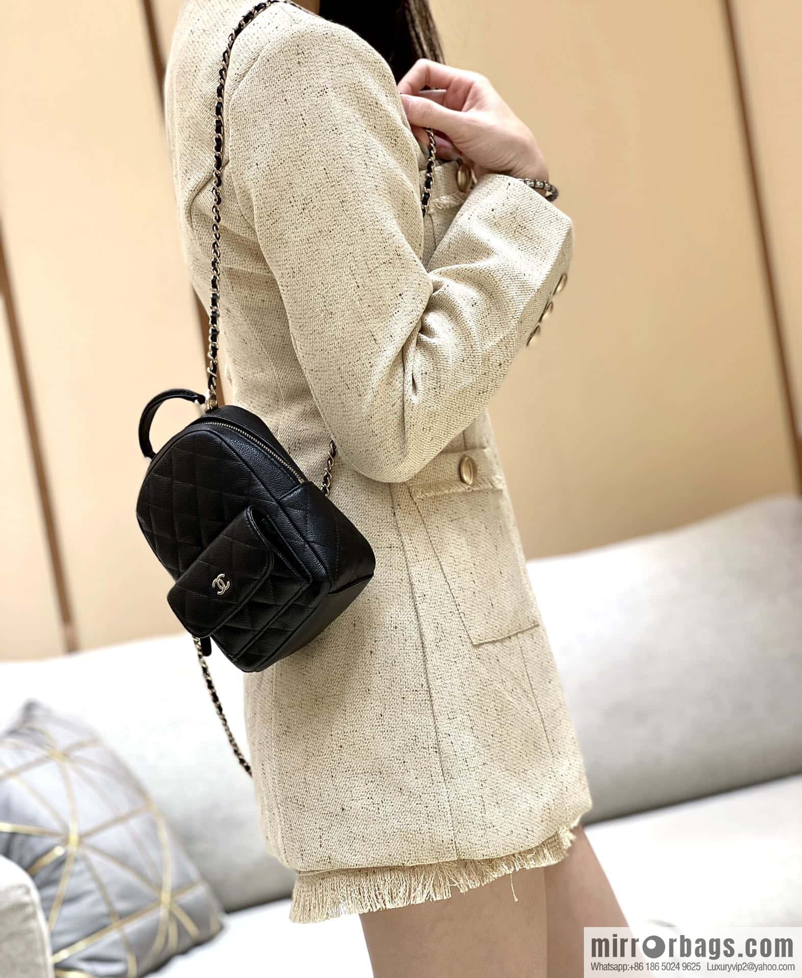 CHANEL 24C early spring vacation series, lychee leather backpack AP3753 black