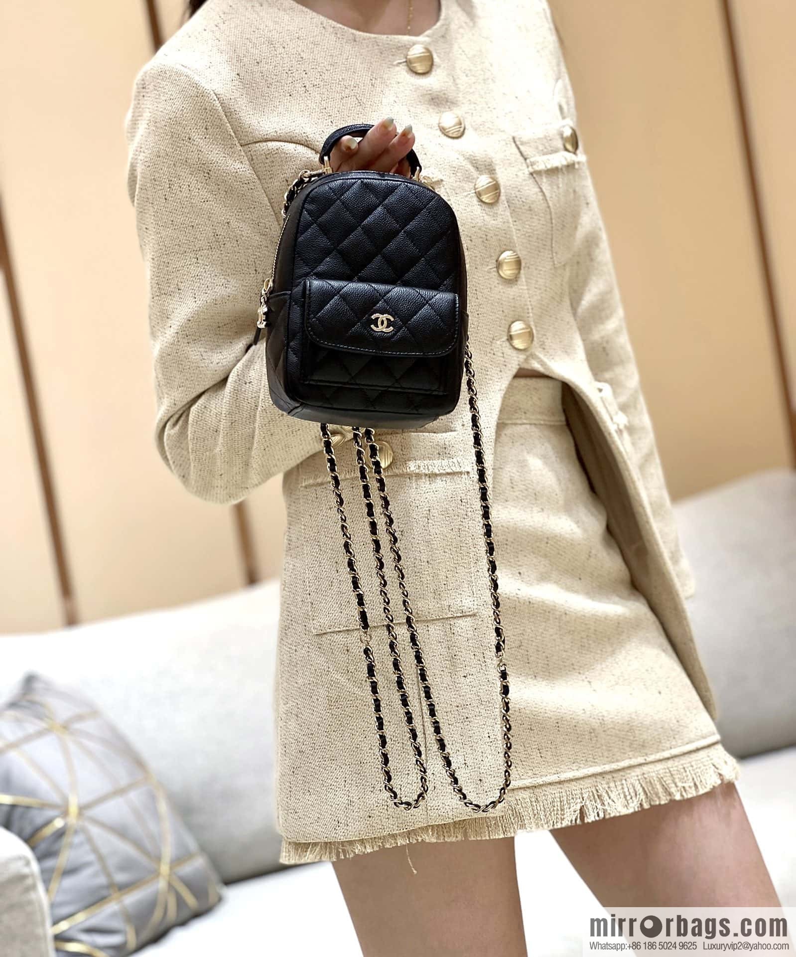 CHANEL 24C early spring vacation series, lychee leather backpack AP3753 black