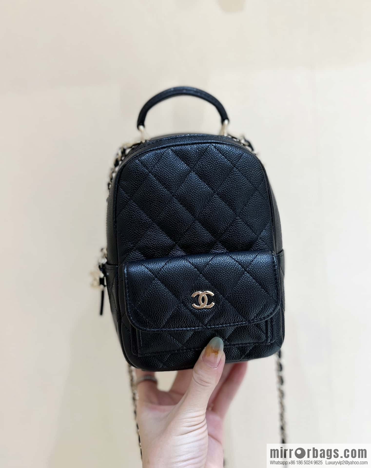 CHANEL 24C early spring vacation series, lychee leather backpack AP3753 black