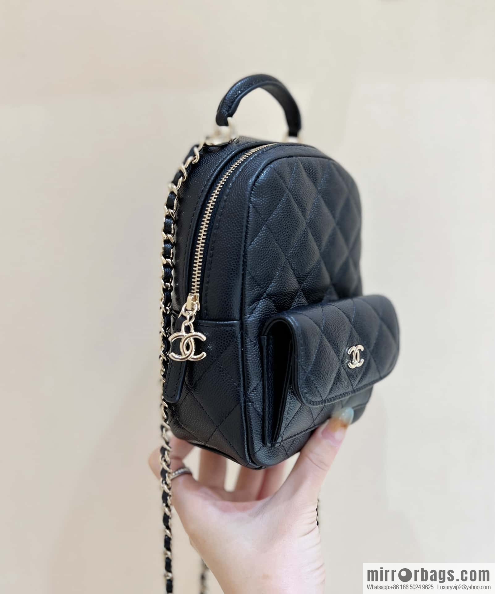 CHANEL 24C early spring vacation series, lychee leather backpack AP3753 black