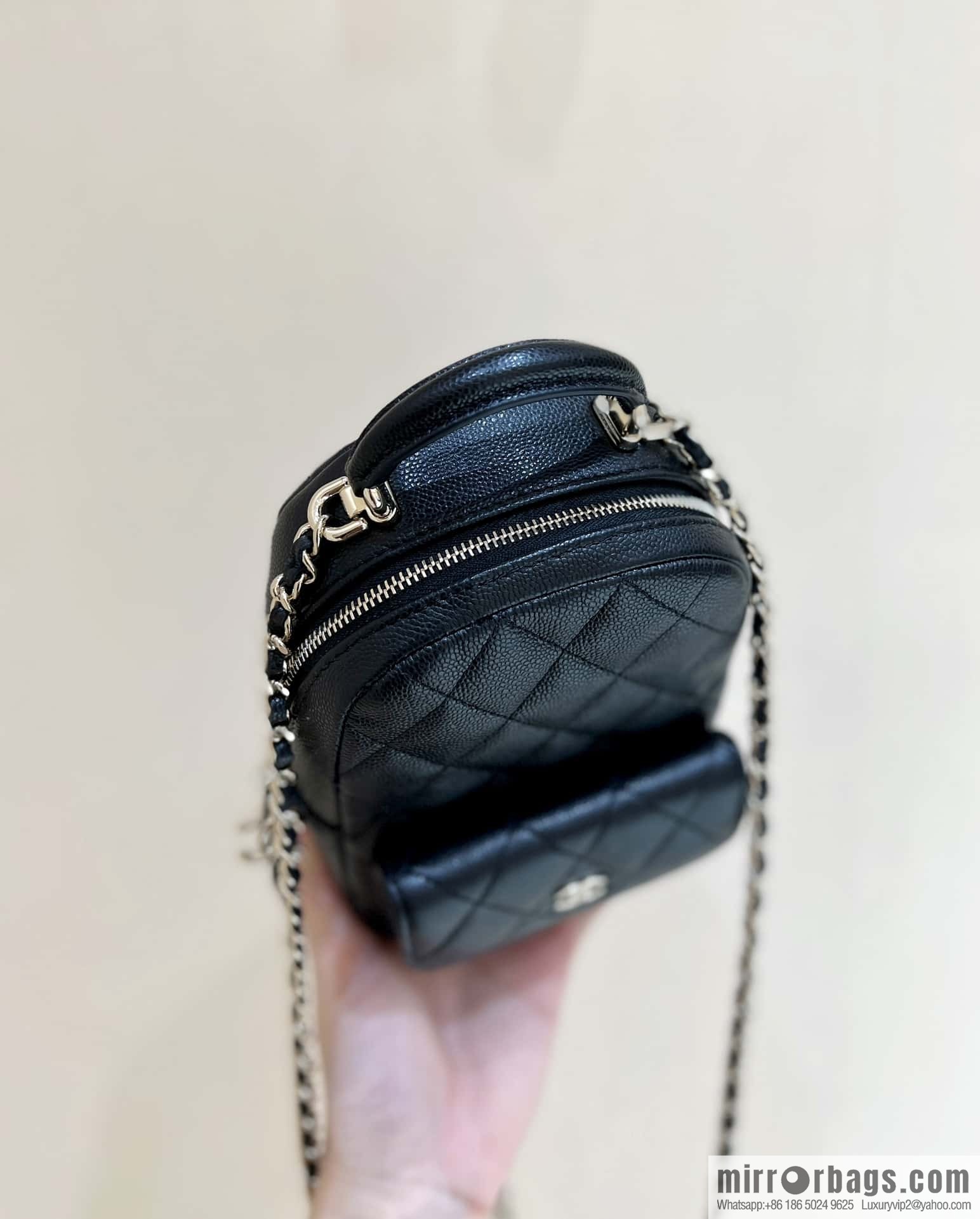CHANEL 24C early spring vacation series, lychee leather backpack AP3753 black
