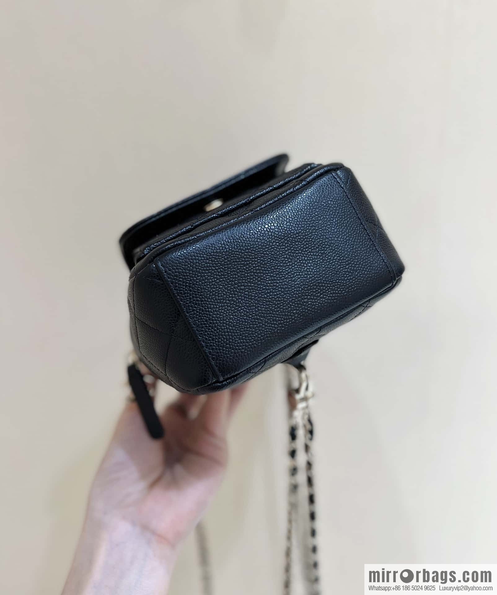CHANEL 24C early spring vacation series, lychee leather backpack AP3753 black