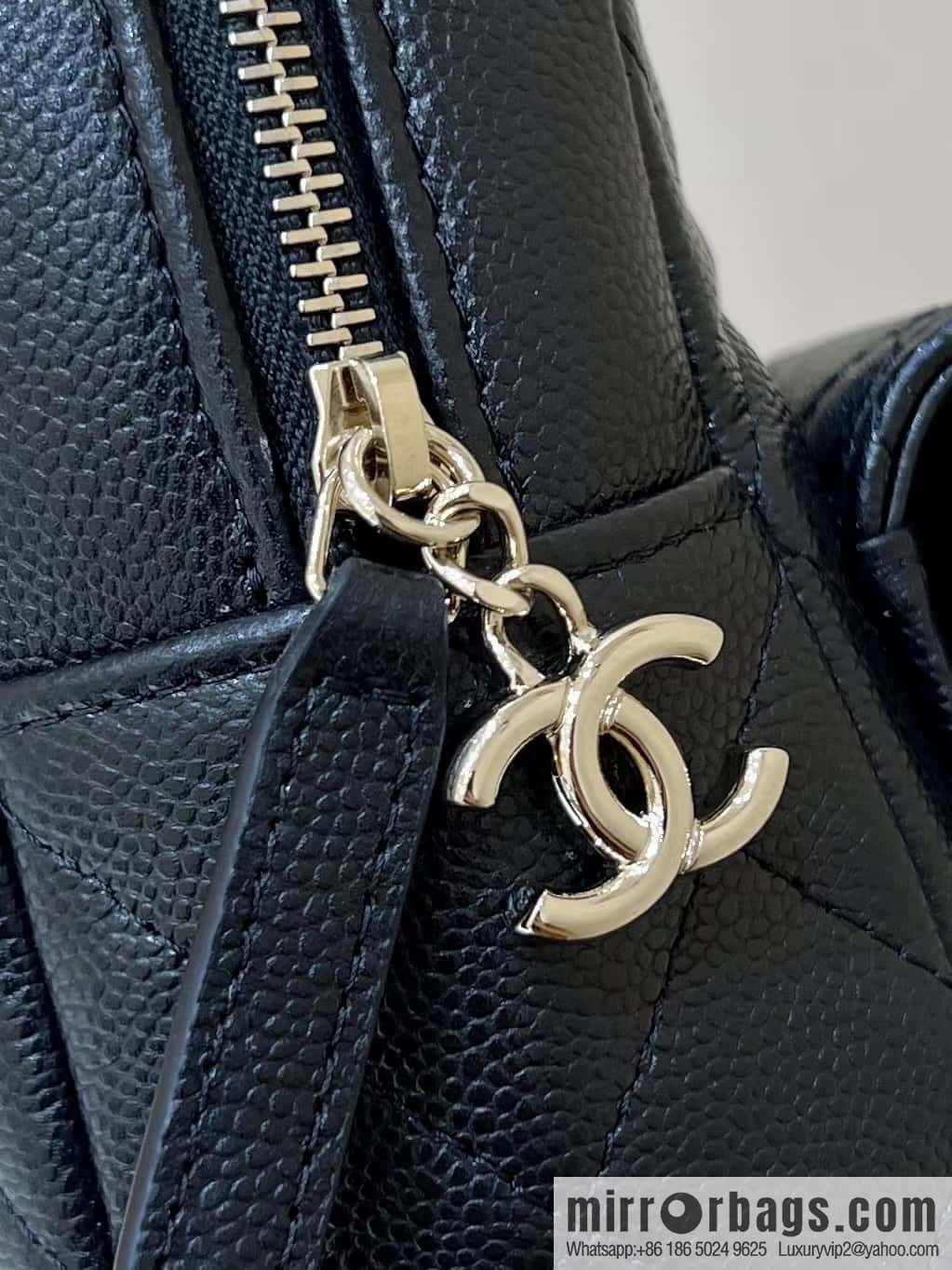 CHANEL 24C early spring vacation series, lychee leather backpack AP3753 black