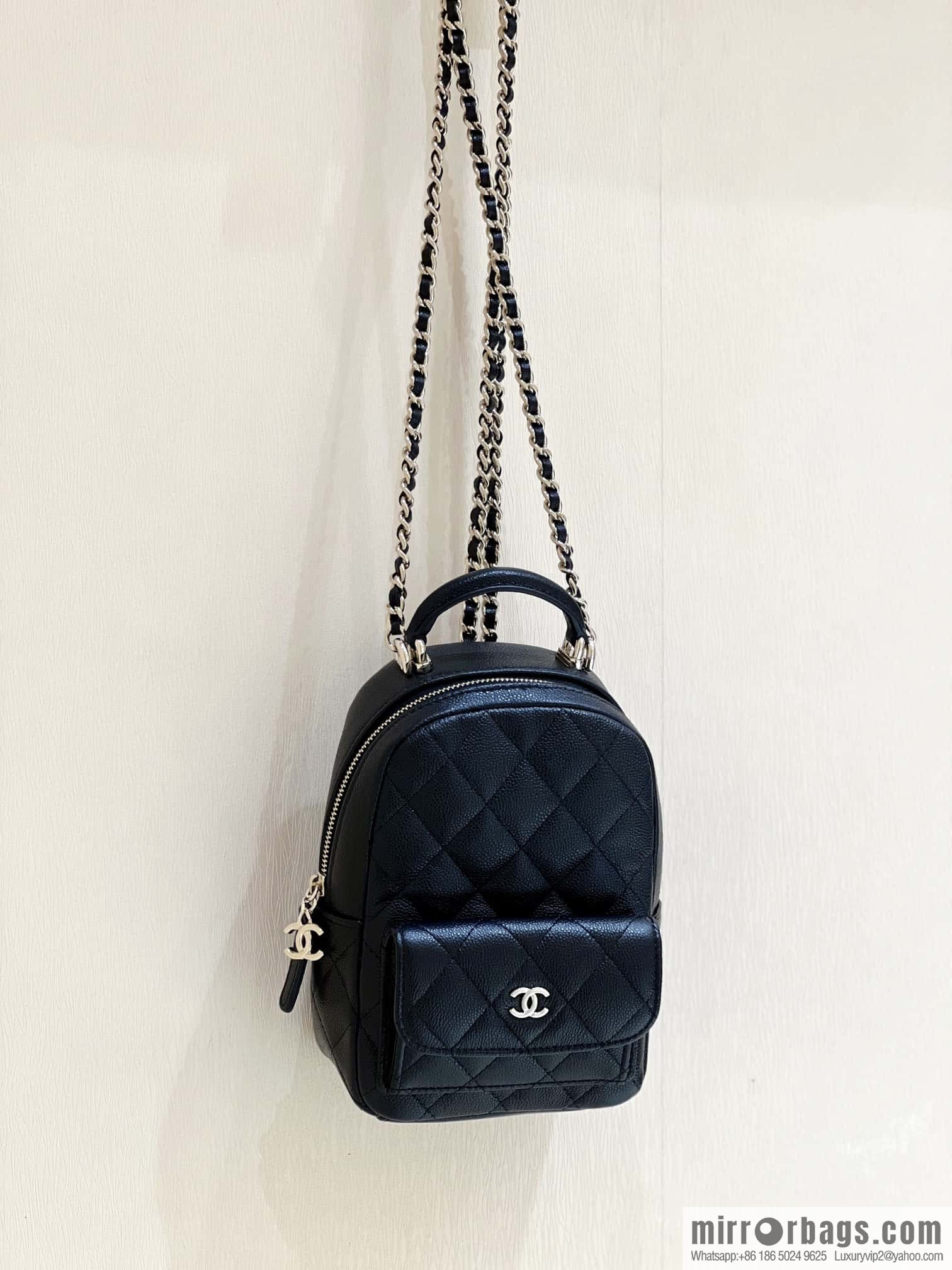 CHANEL 24C early spring vacation series, lychee leather backpack AP3753 black