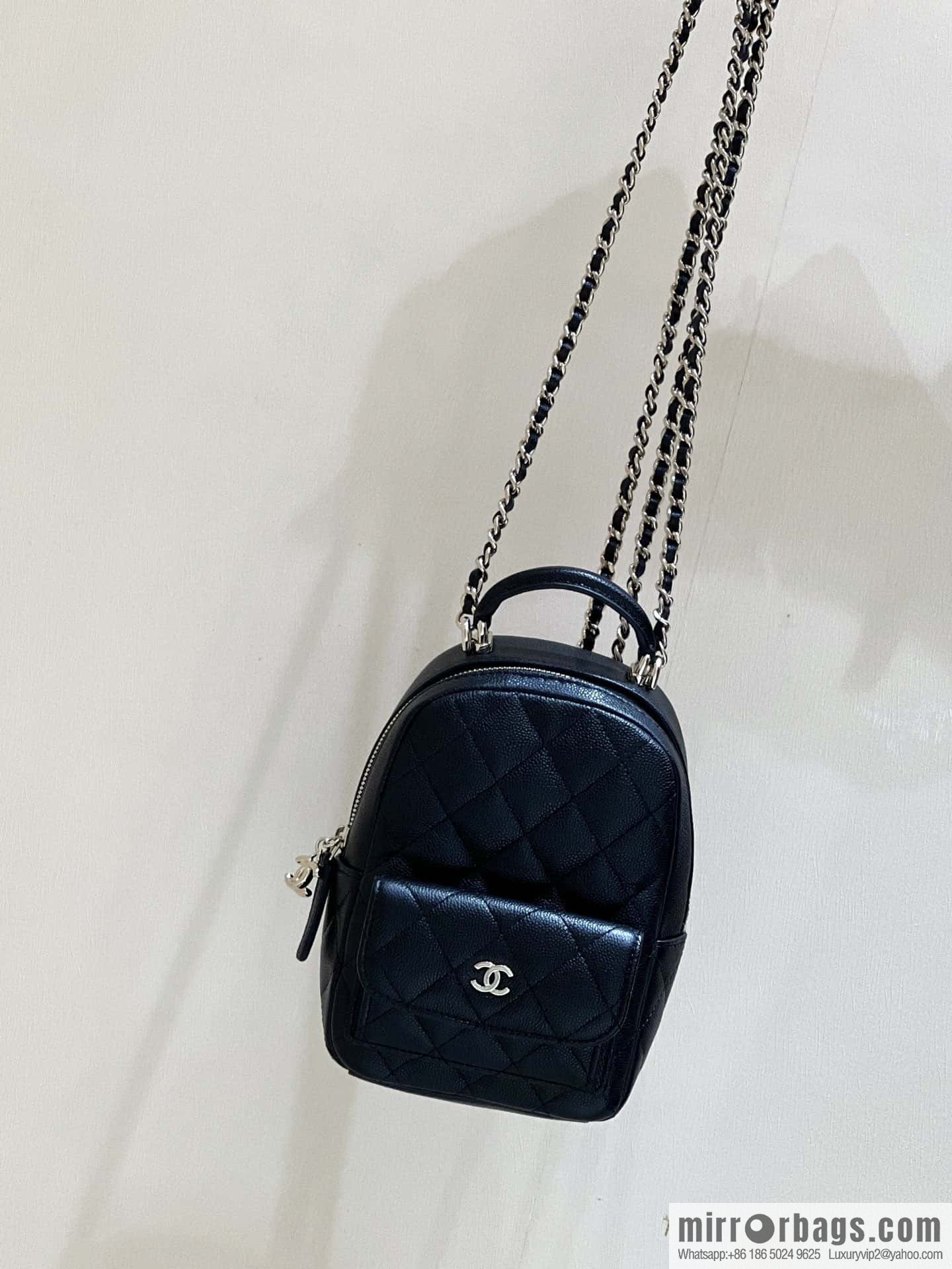 CHANEL 24C early spring vacation series, lychee leather backpack AP3753 black