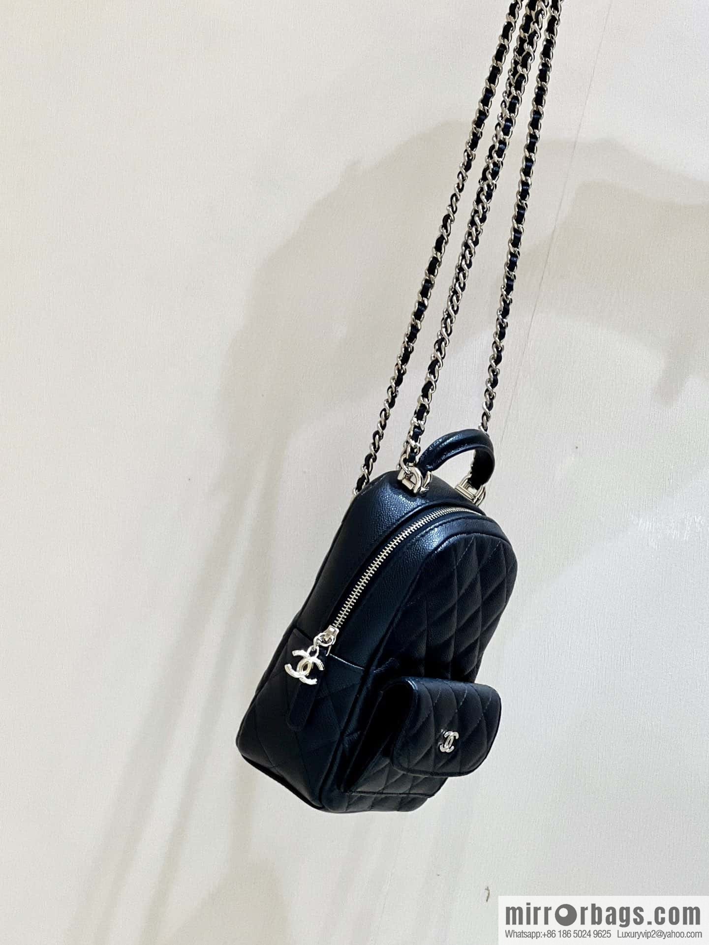 CHANEL 24C early spring vacation series, lychee leather backpack AP3753 black
