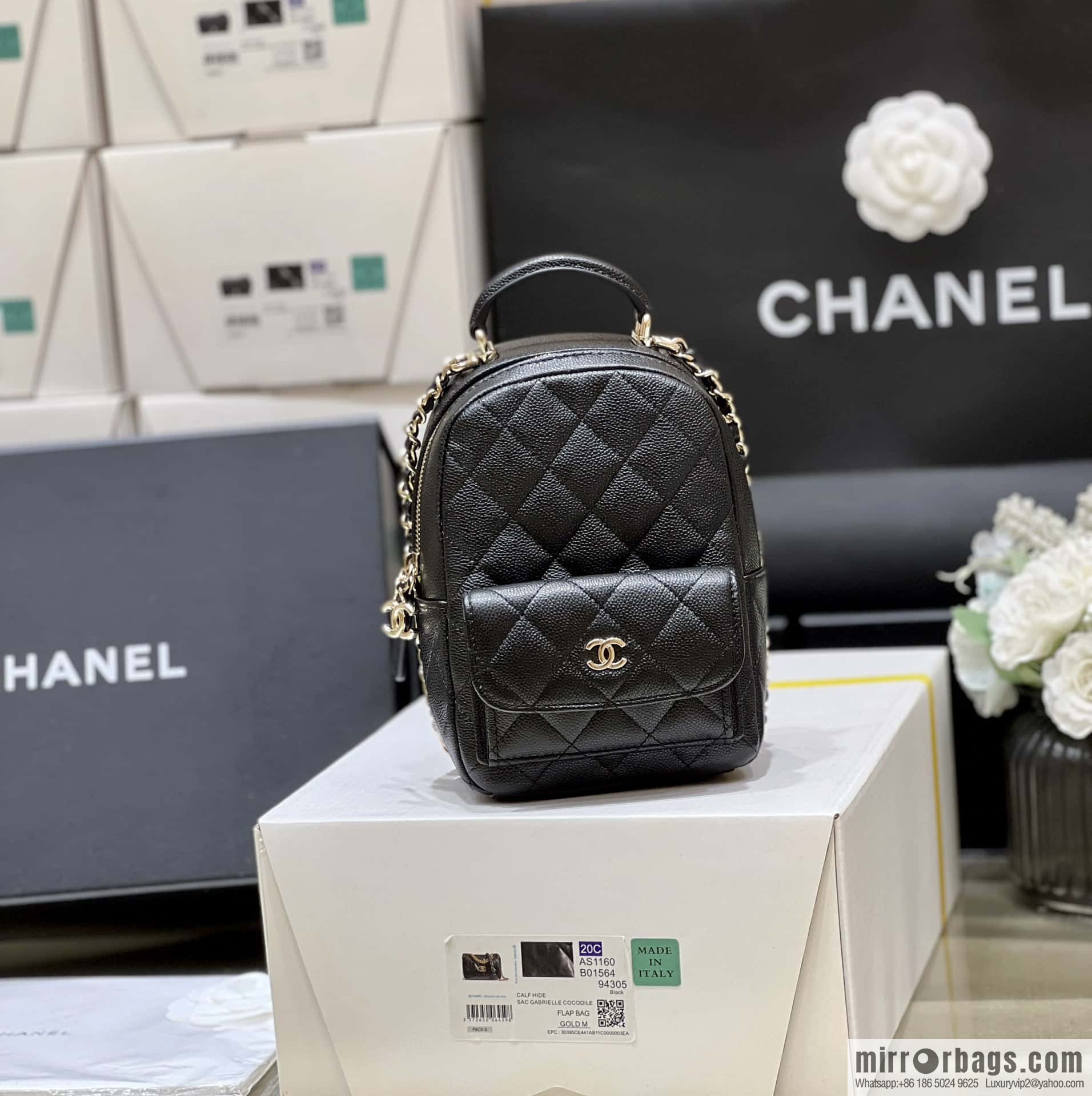 CHANEL 24C early spring vacation series, lychee leather backpack AP3753 black