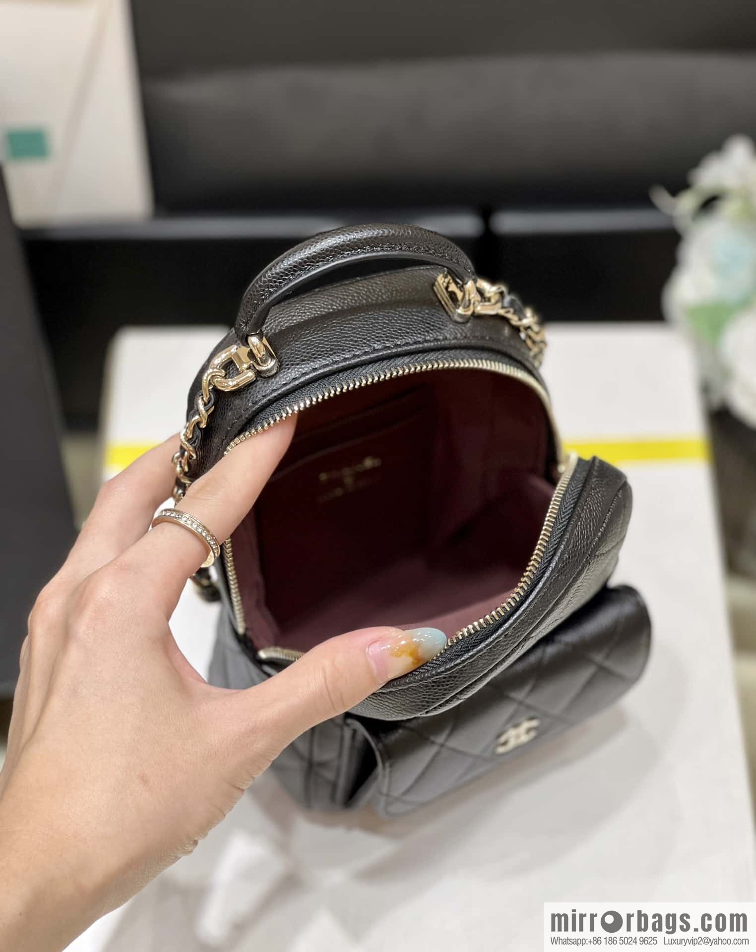 CHANEL 24C early spring vacation series, lychee leather backpack AP3753 black
