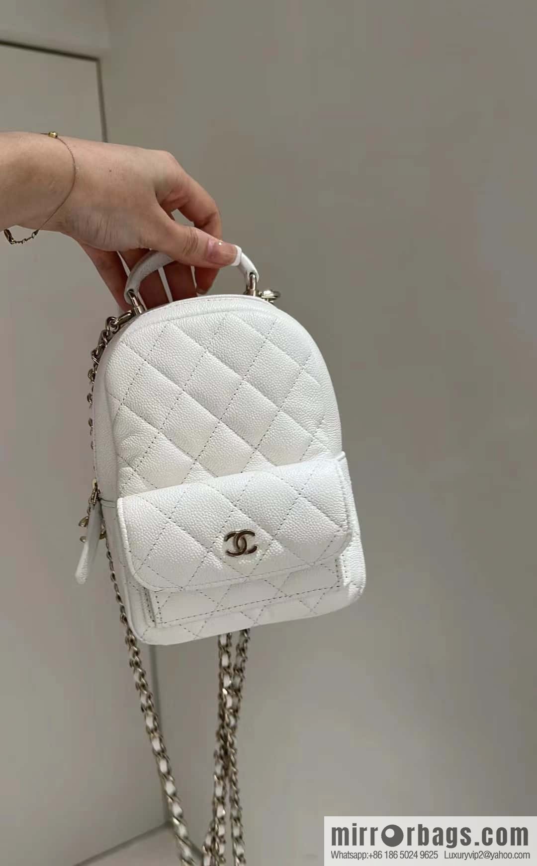 CHANEL 24C early spring holiday series, lychee leather backpack AP3753 white