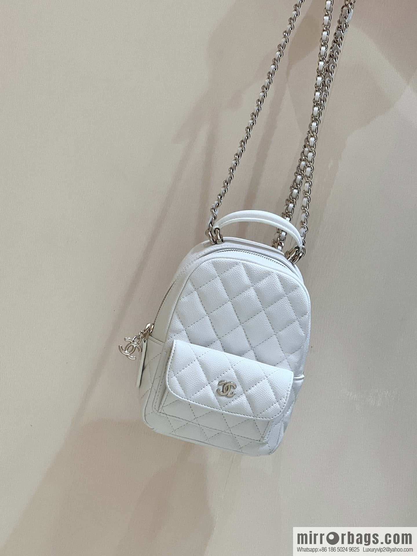CHANEL 24C early spring holiday series, lychee leather backpack AP3753 white