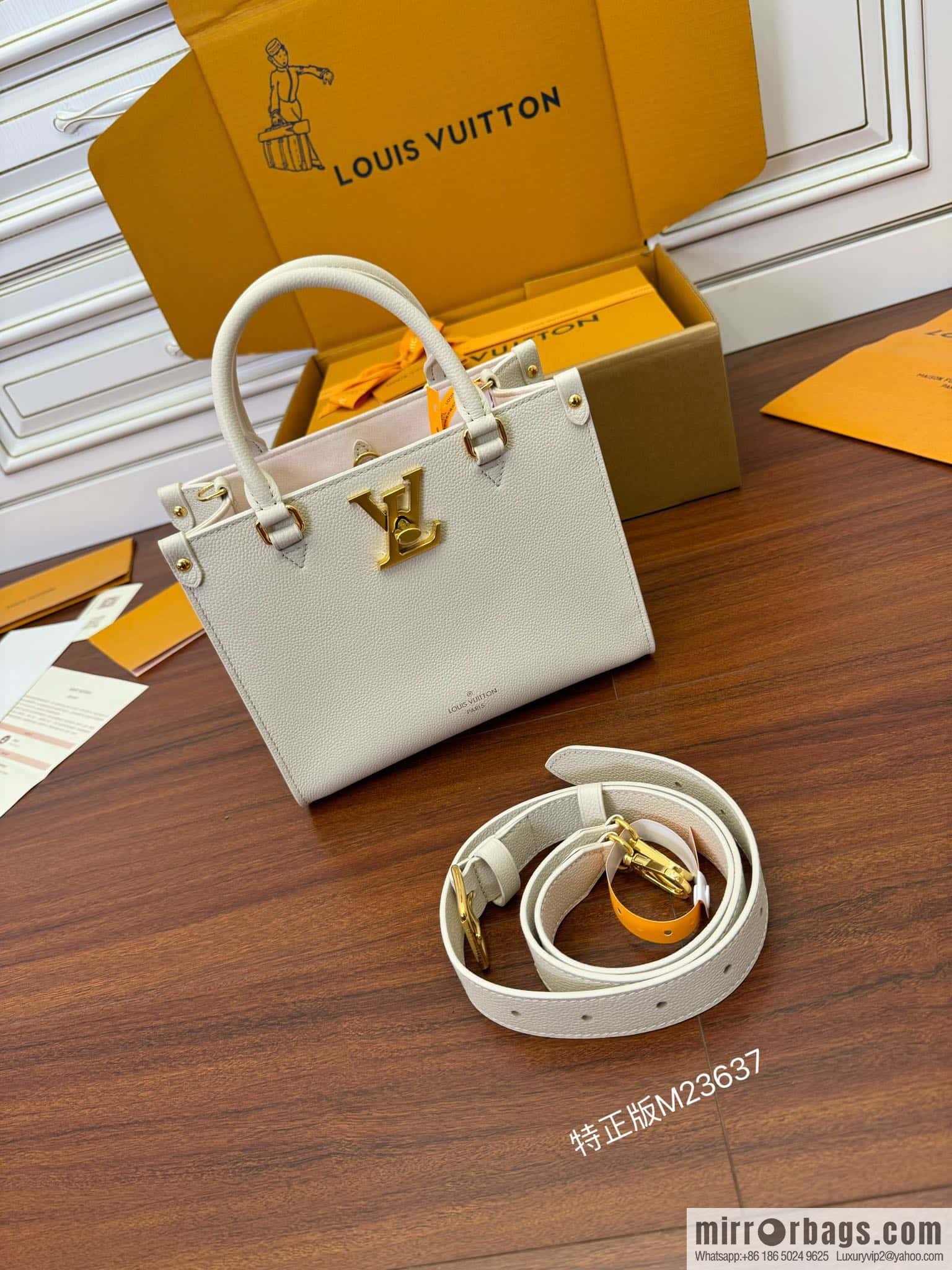 LV M23637 Lock & Go