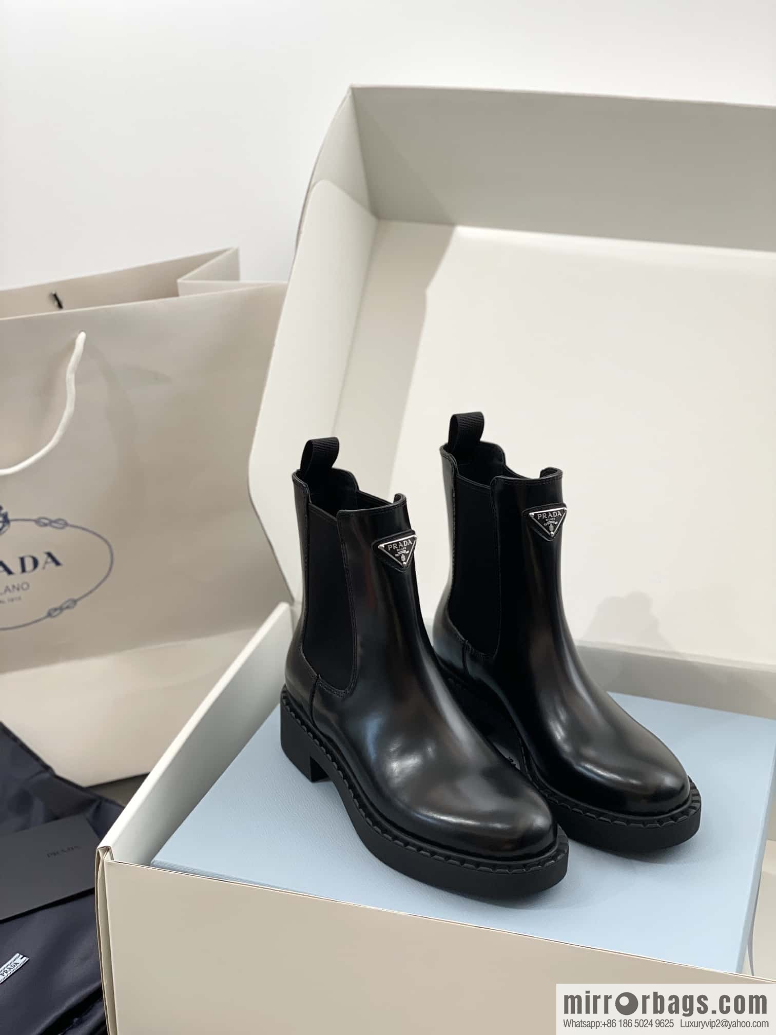 PRADA Triangle Chelsea, pipe boots