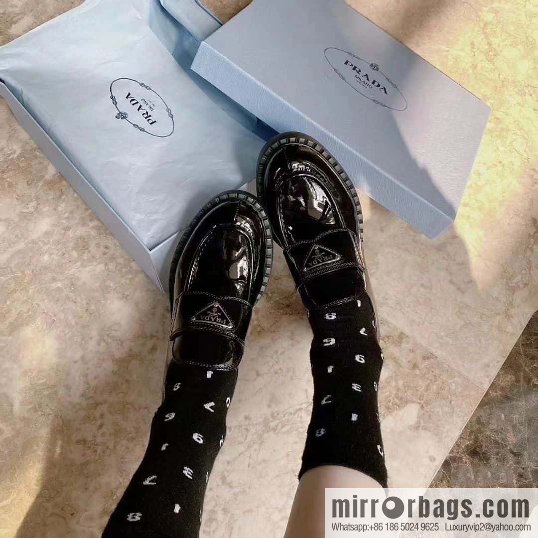 Prada, Puhada glossy patent leather triangle loafers
