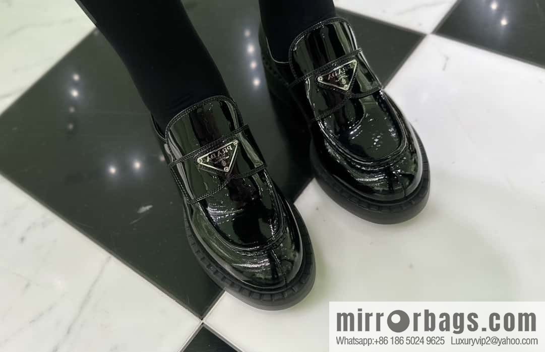 Prada, Puhada glossy patent leather triangle loafers