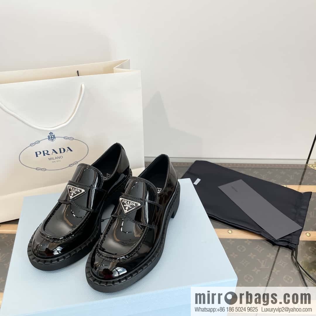 Prada, Puhada glossy patent leather triangle loafers
