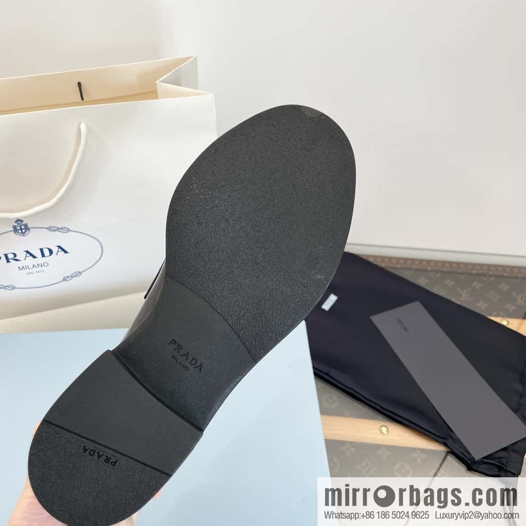 Prada, Puhada glossy patent leather triangle loafers